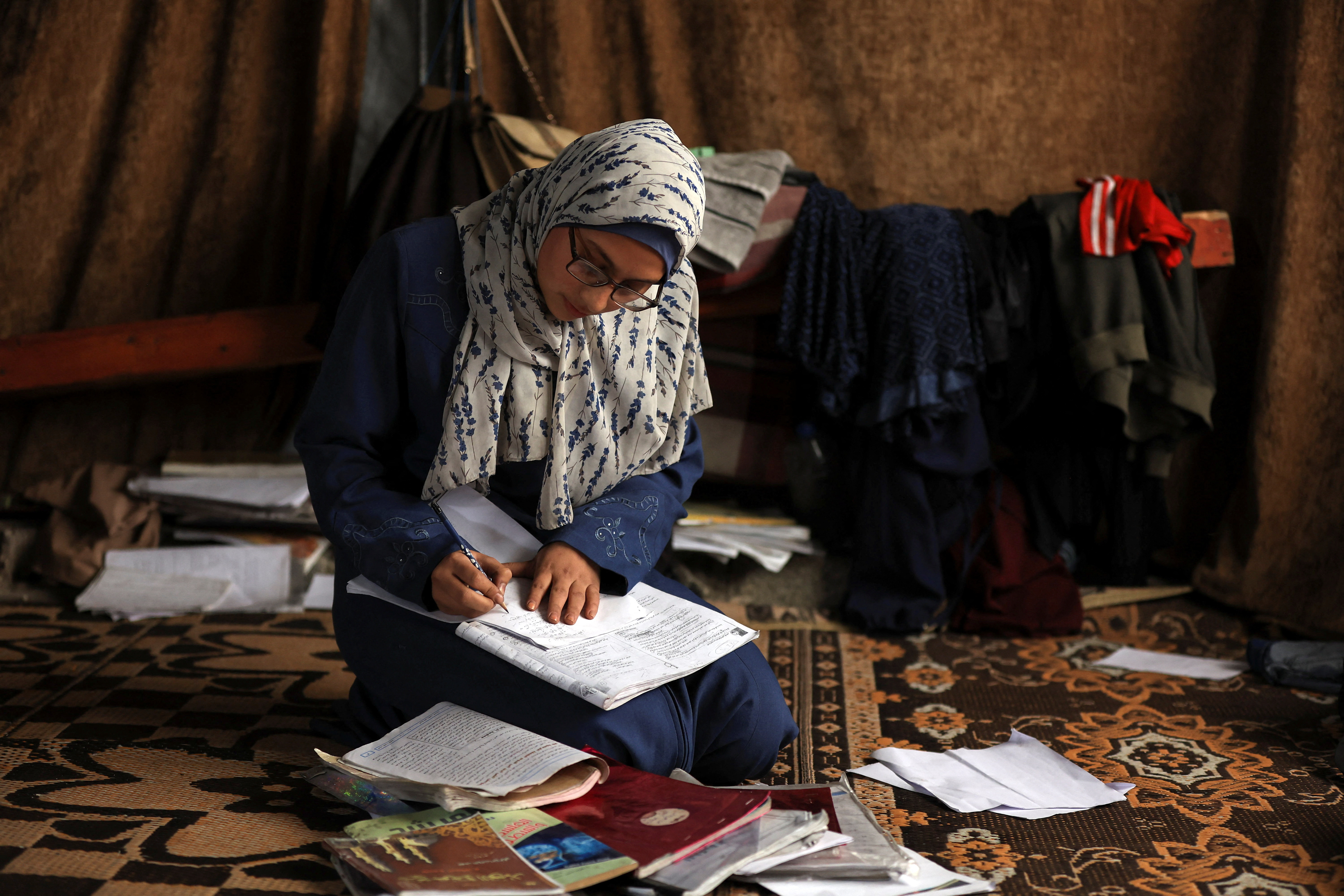 For Gaza students, big ambitions replaced by desperate search for food