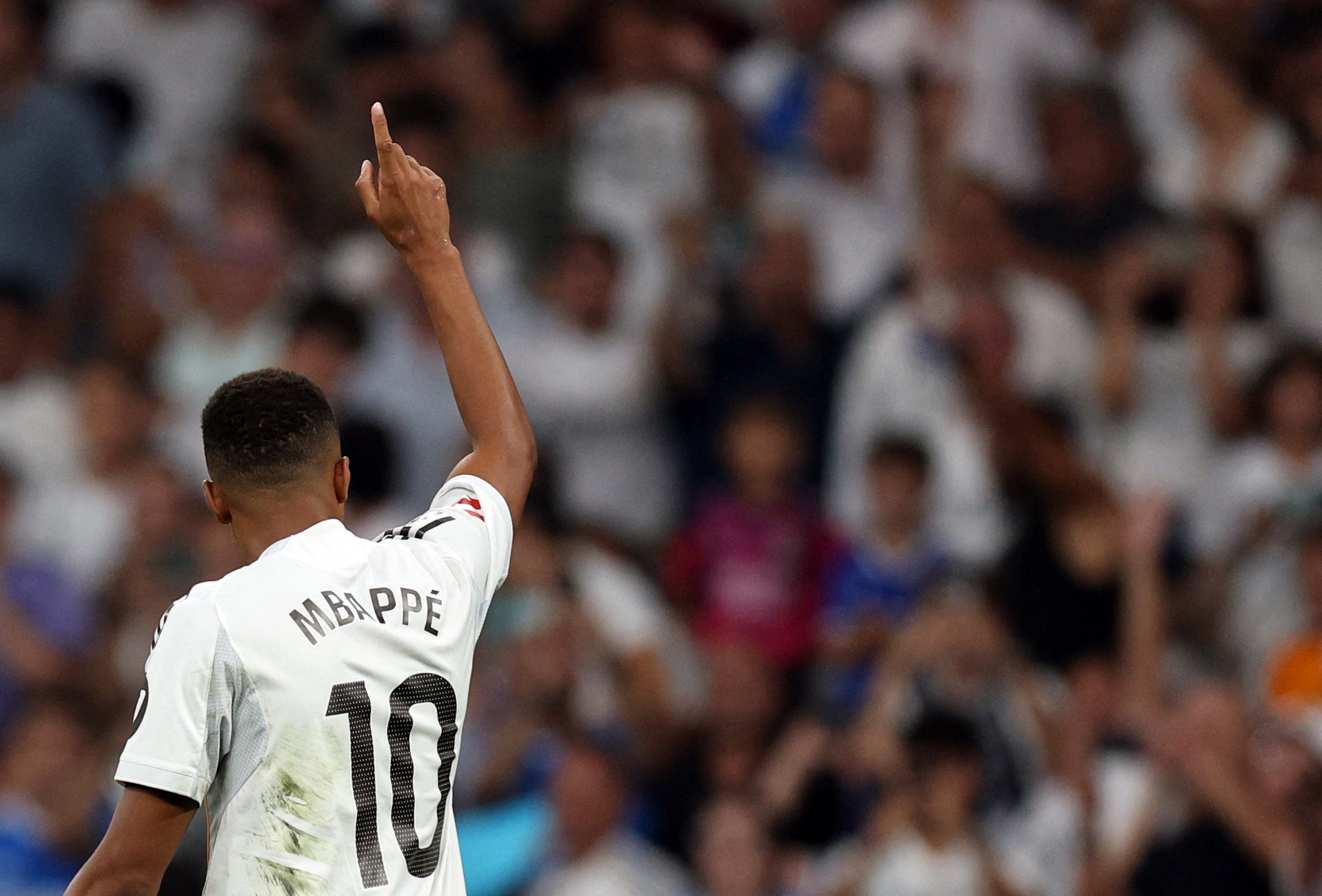 Real Madrid's Kylian Mbappe celebrates scoring their first goal of the new La Liga season