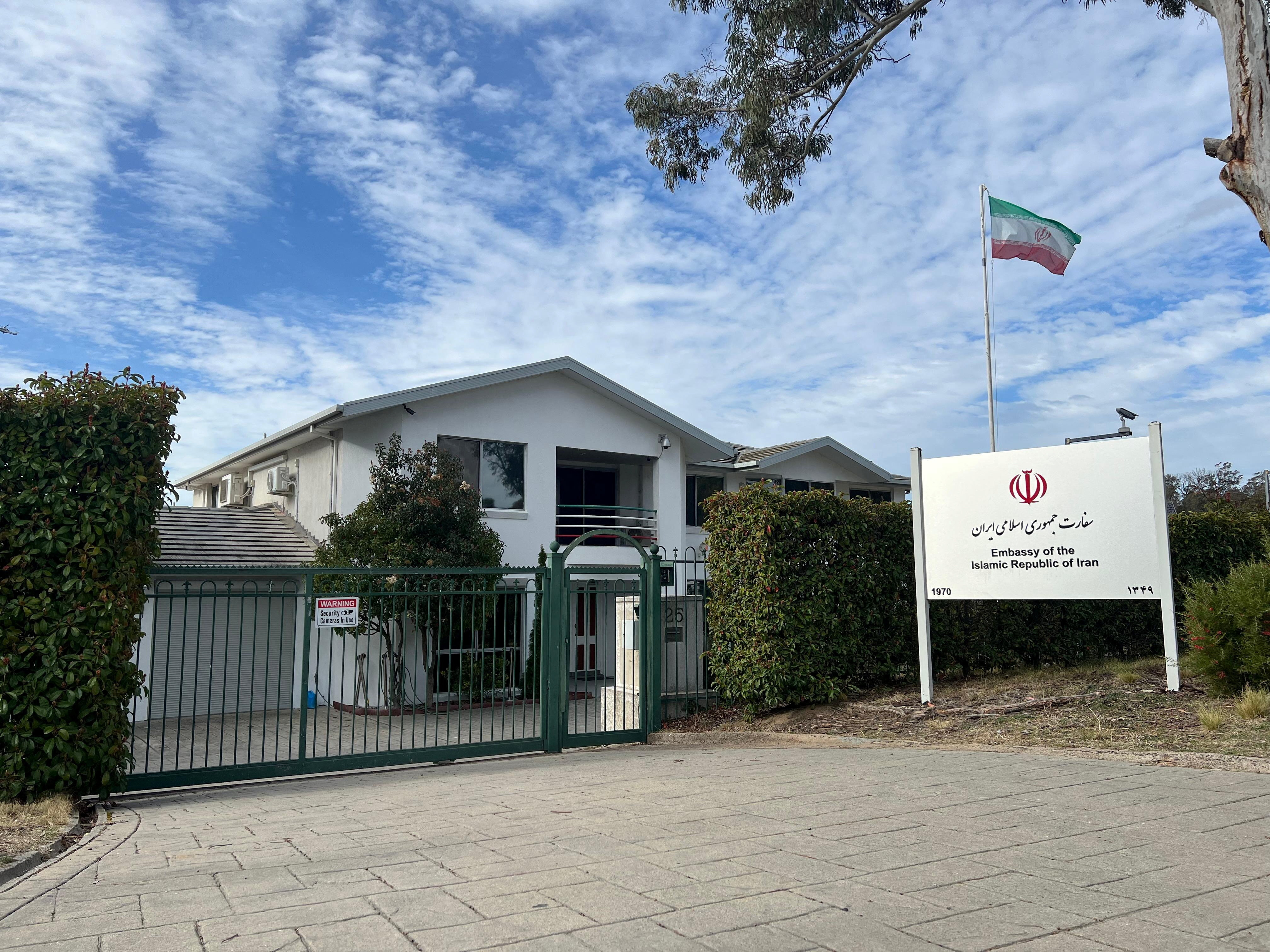 A flag flutters above the Embassy of the Islamic Republic of Iran in Canberra, Australia, August 26, 2025. Australia’s Prime Minister Anthony Albanese has expelled Iran’s ambassador, accusing Iran of orchestrating at least two antisemitic attacks on Australian soil. REUTERS/Peter Hobson