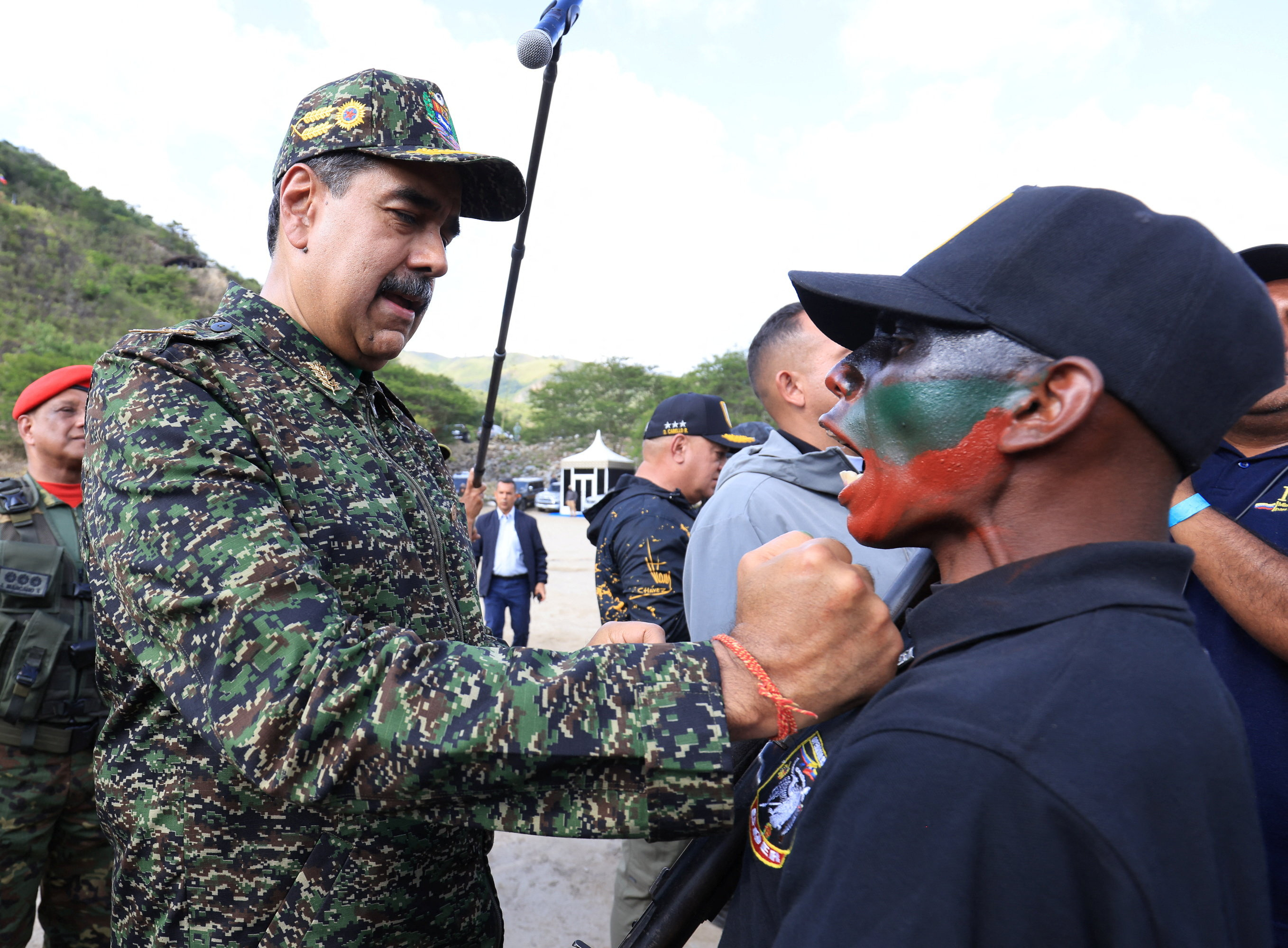 Venezuela's President Nicolas Maduro decorates a member of the special forces during the closing ceremony of the second Revolutionary Special Operations Course (COER), held at the Command Action Group of the Bolivarian National Guard at Macarao parish, in Caracas, Venezuela, August 28, 2025. Miraflores Palace/Handout via REUTERS THIS IMAGE HAS BEEN SUPPLIED BY A THIRD PARTY
