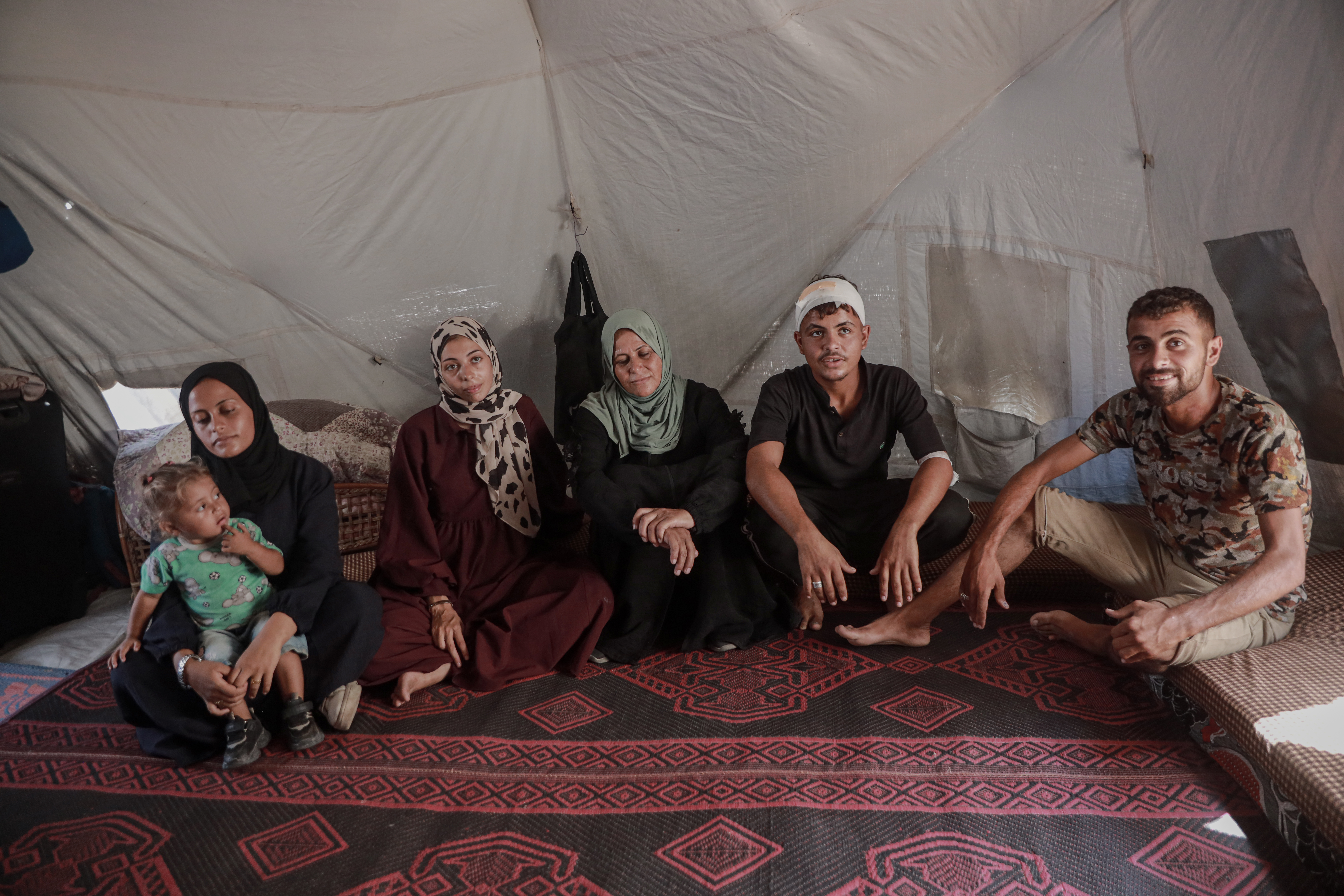 The al-Rahel family sat down in a tent