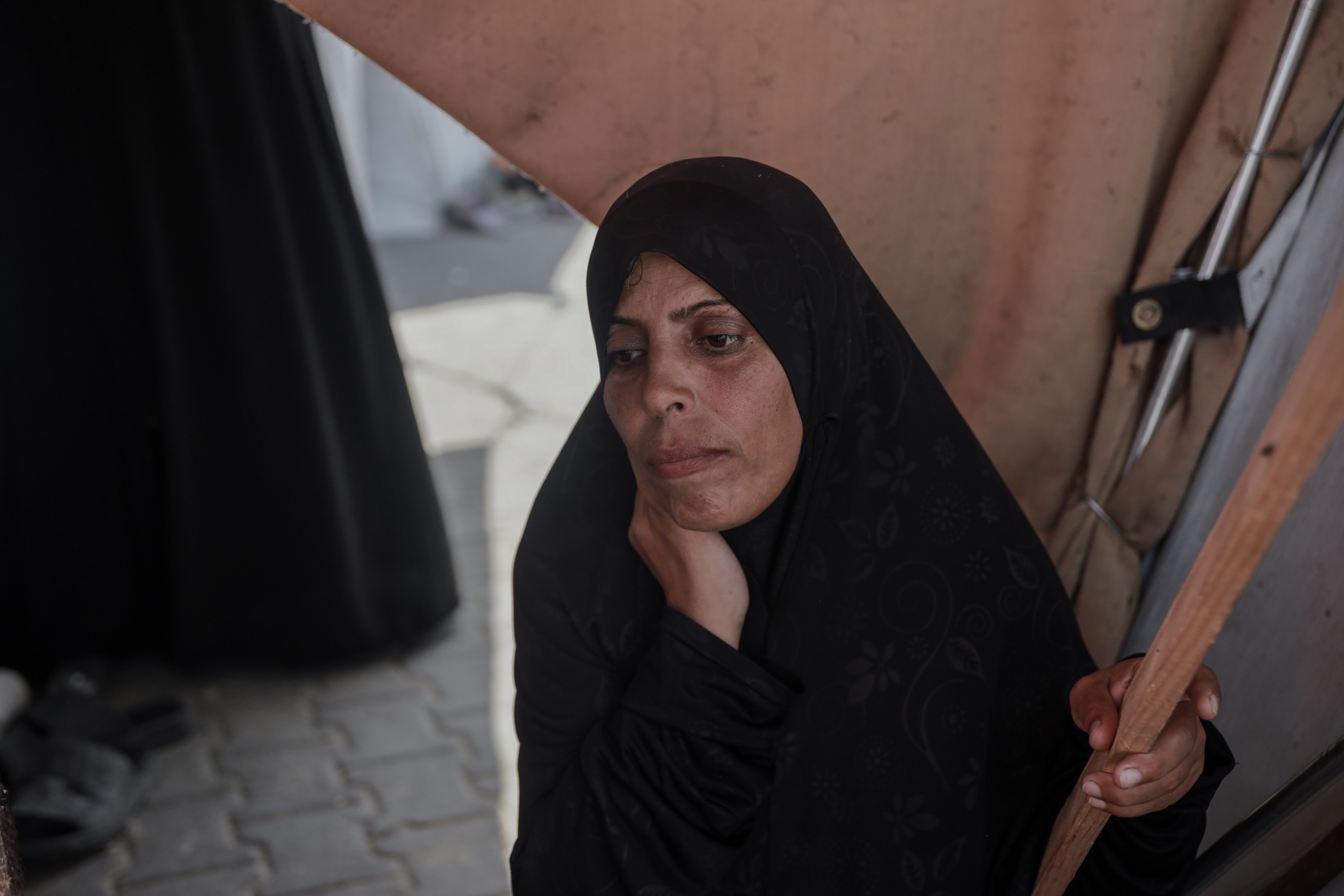Manal Abu Owda, 39, refuses to leave Gaza city to the south and insists on staying despite her family’s objection