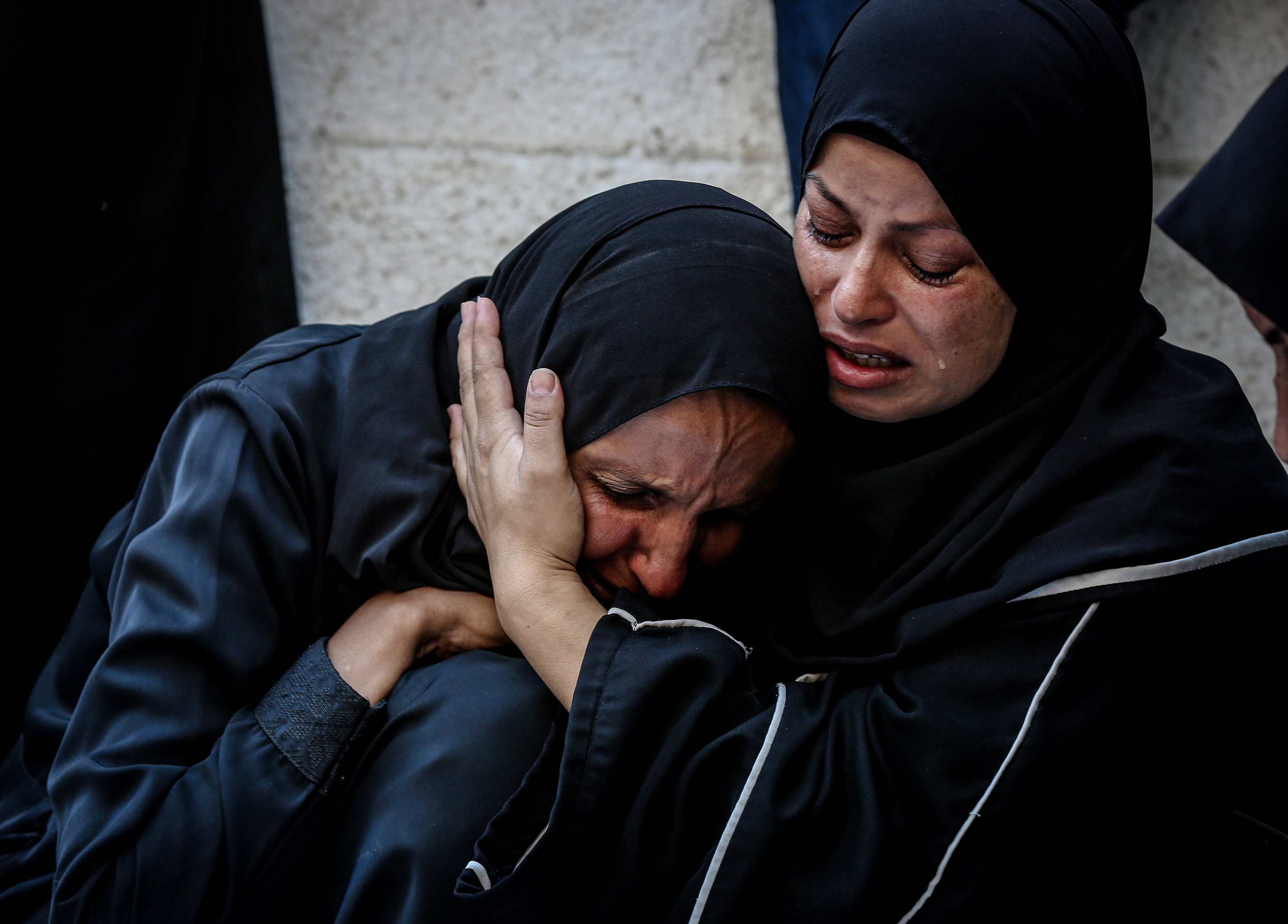 Relatives of killed Palestinians mourn their loved ones.