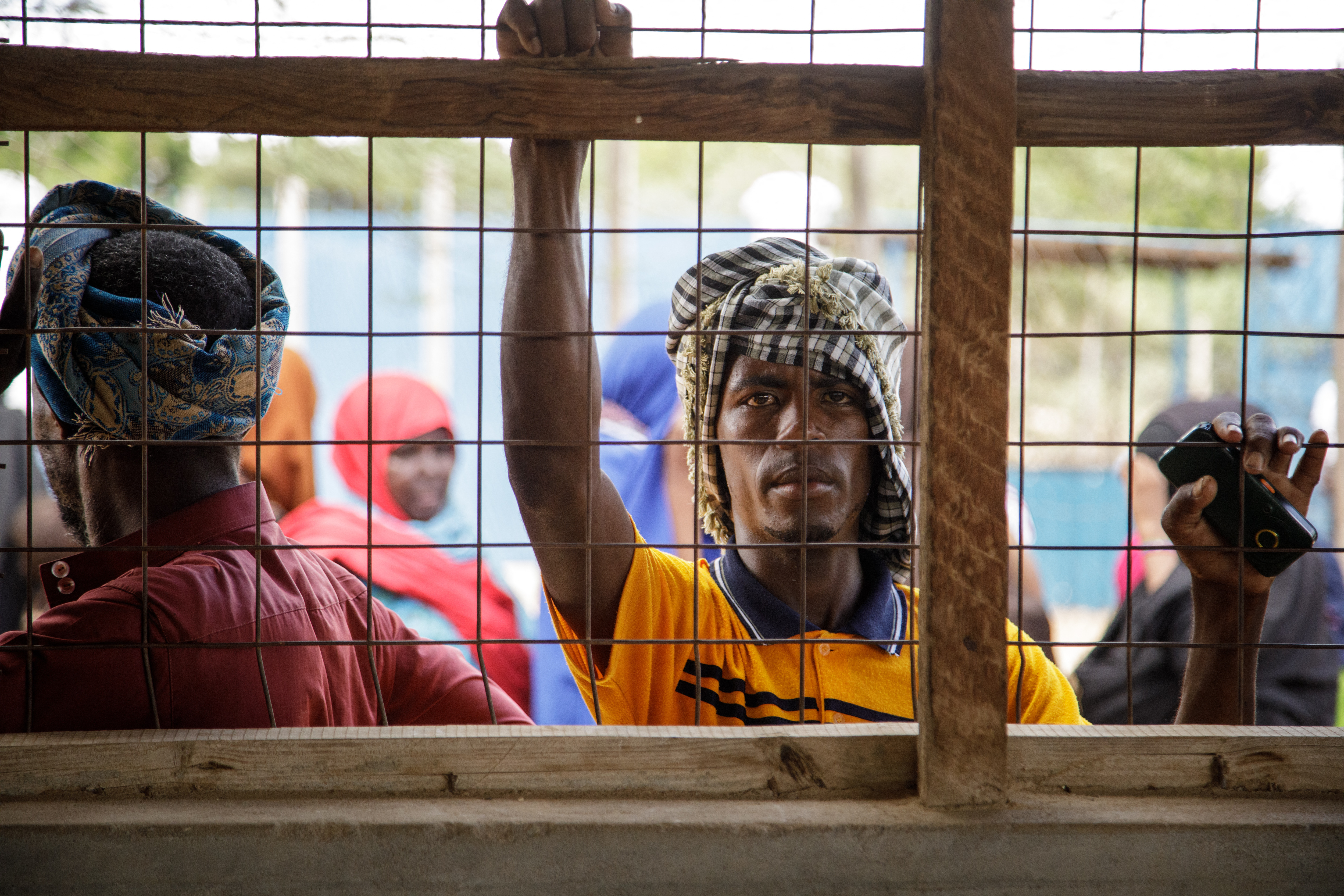 Newly arrived Somali refugees wait at the profiling and resigtration centre in the Dadaab refugee camp, one of Africa's largest refugee camps in Kenya, on March 23, 2023.