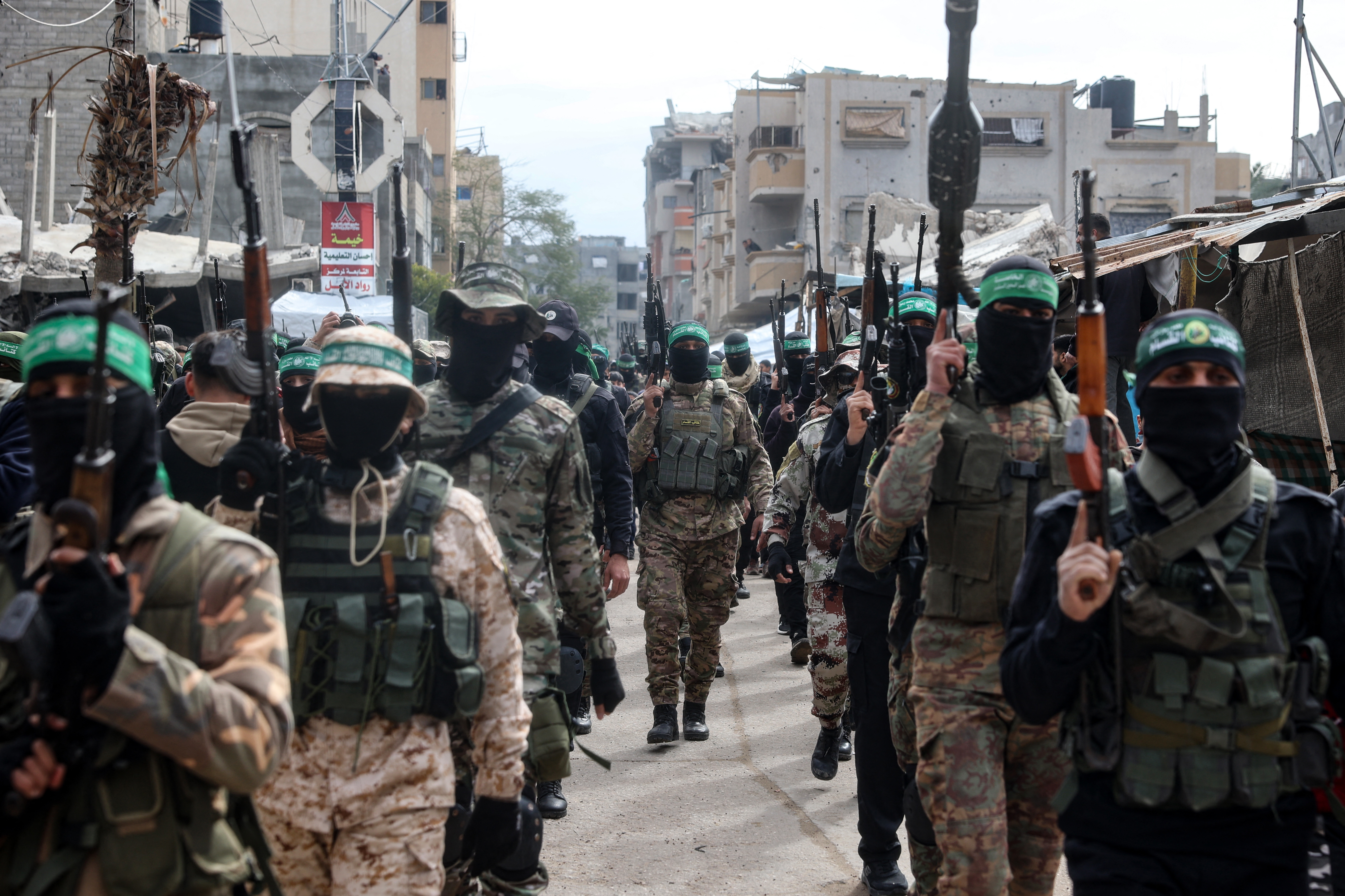 Palestinian fighters from the Ezzedine al-Qassam Brigades