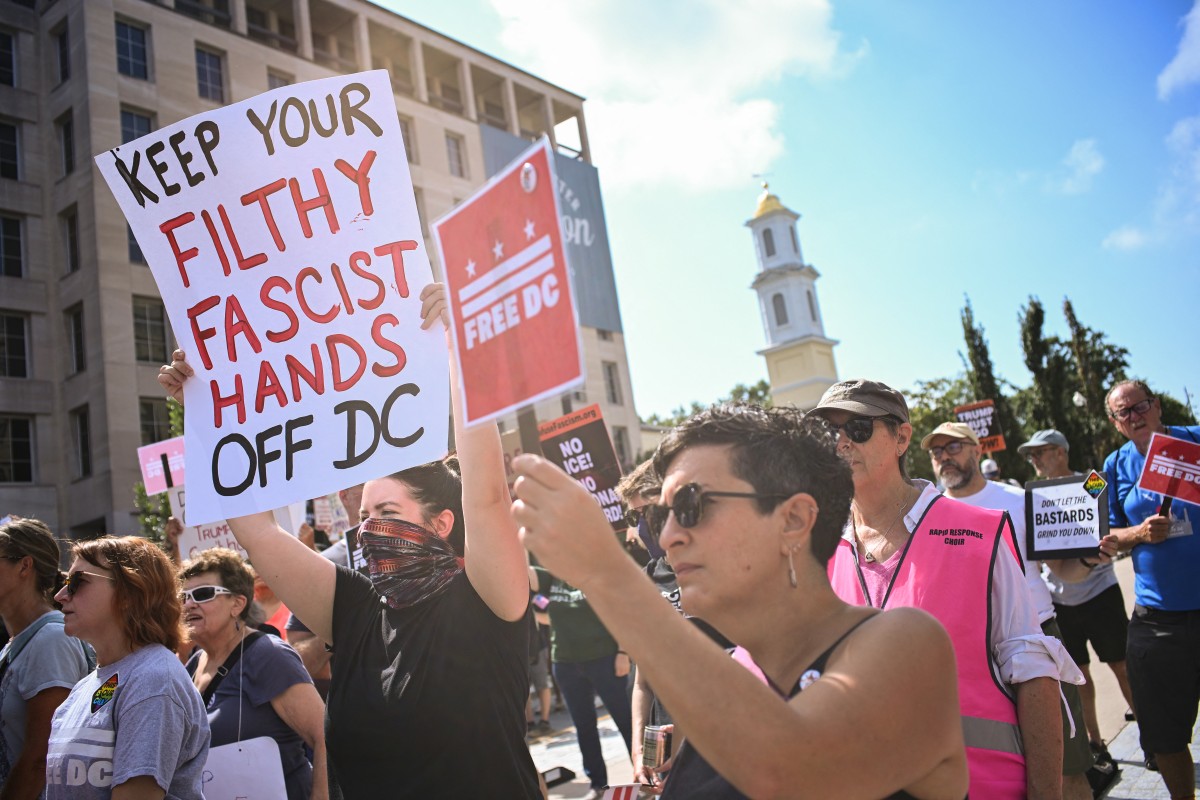 Local residents rally against US President Donald Trump's plans to activate federal law enforcement in Washington, DC, on August 11, 2025. [Mandel Ngan/AFP]