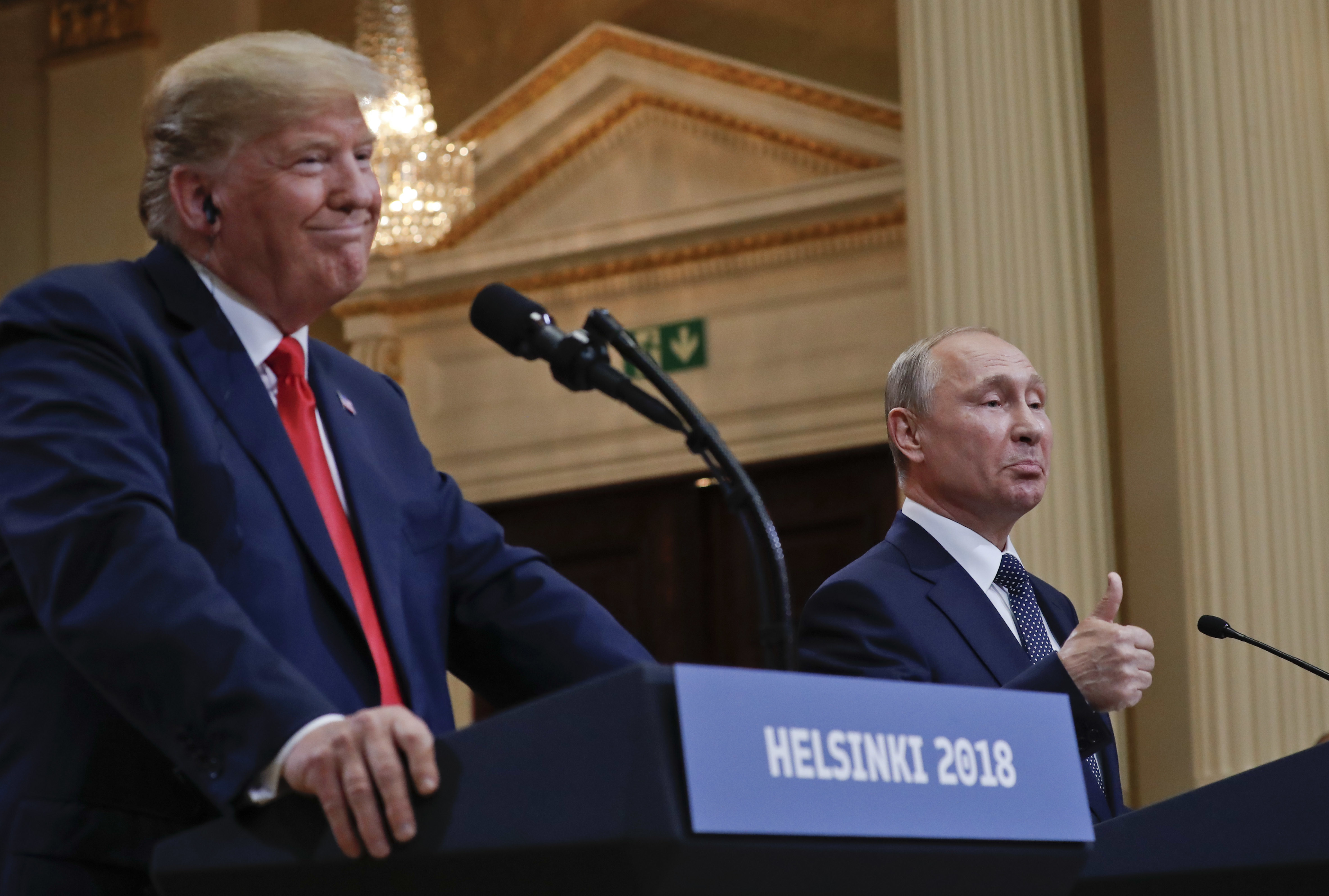 FILE - Russian President Vladimir Putin, right, and U.S. President Donald Trump give a joint news conference at the Presidential Palace in Helsinki, Finland, July 16, 2018. (AP Photo/Pablo Martinez Monsivais, File)