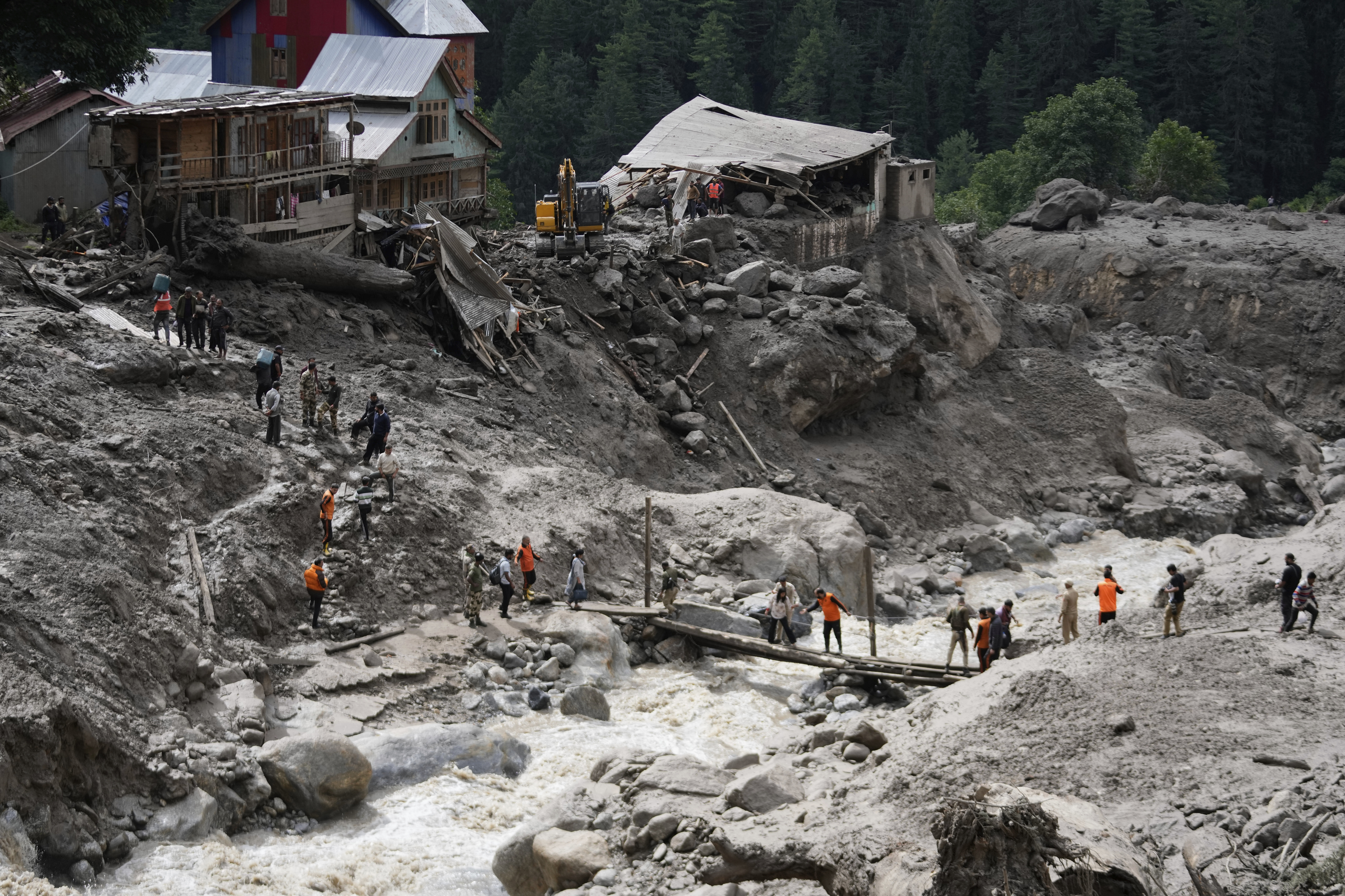 Rescuers search for missing flash flood victims in remote Kashmir village