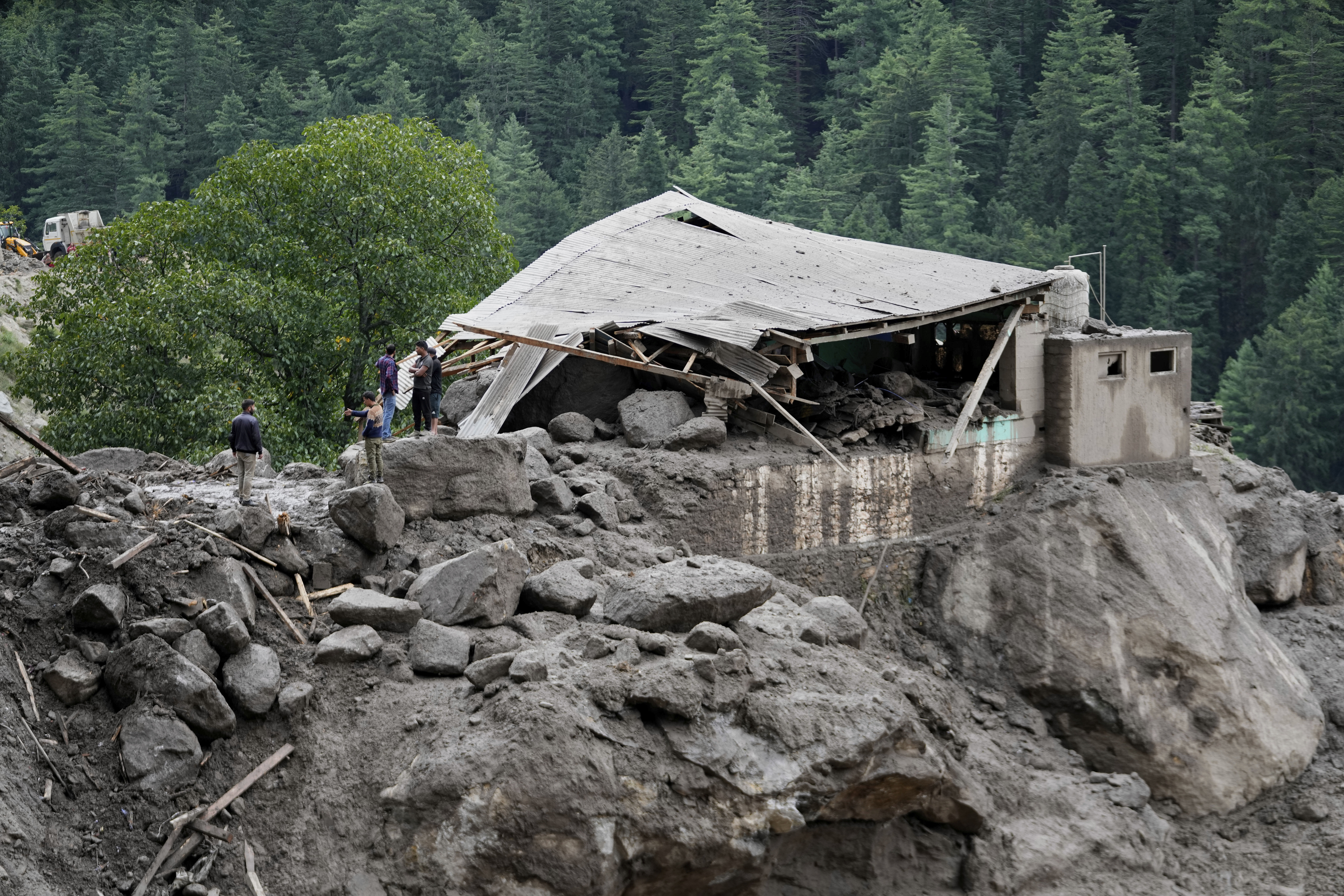 Rescuers search for missing flash flood victims in remote Kashmir village