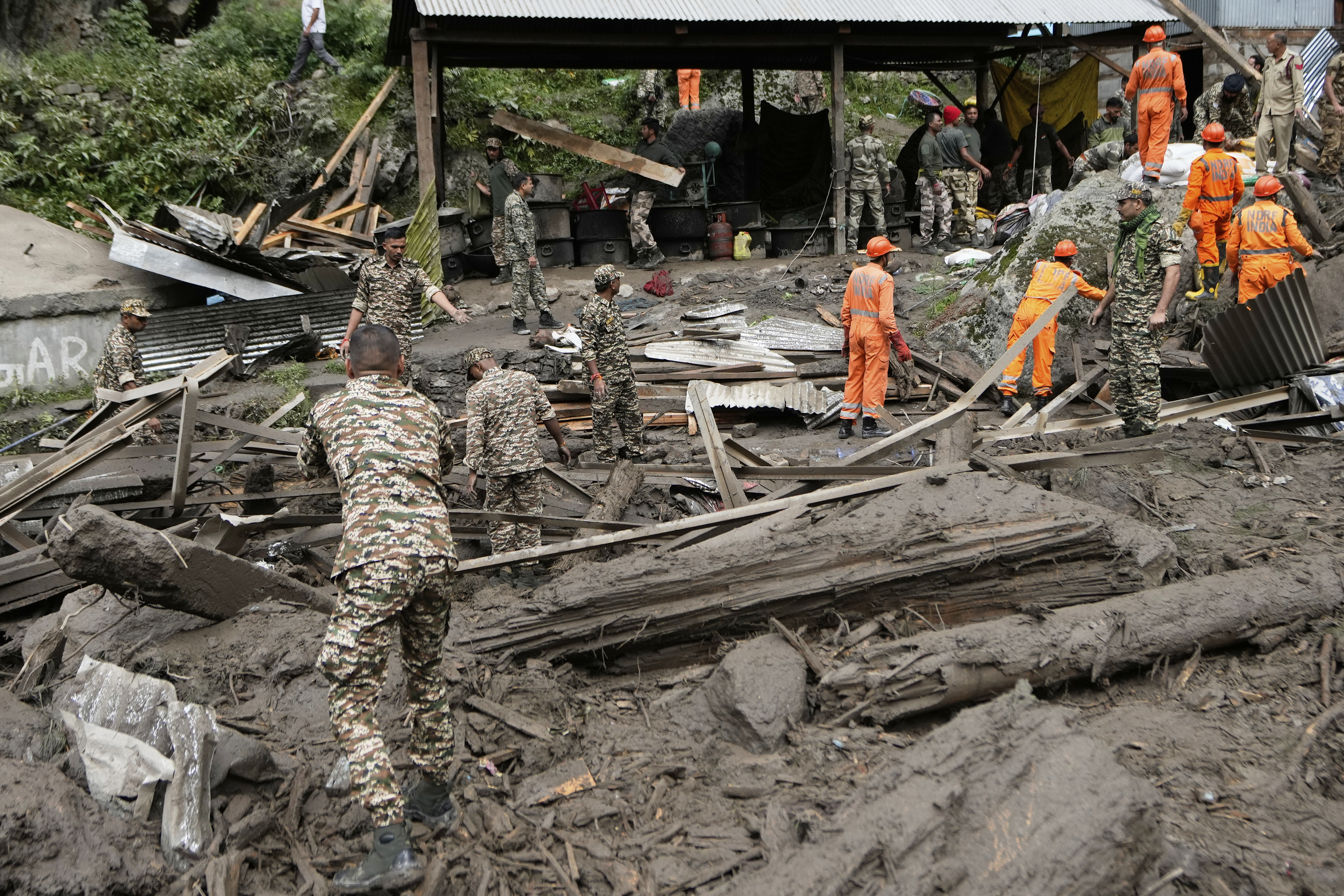 Rescuers search for missing flash flood victims in remote Kashmir village