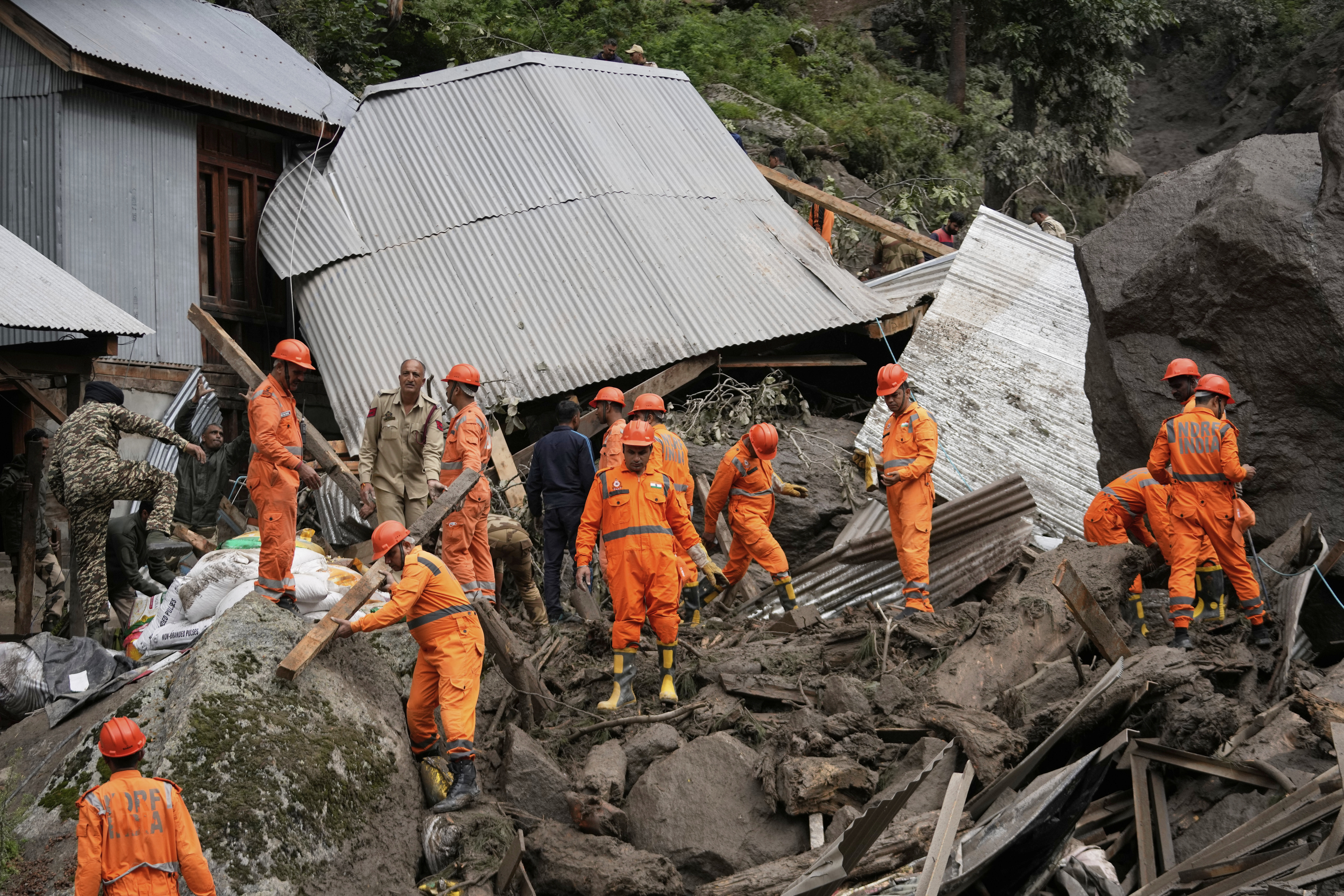 Rescuers search for missing flash flood victims in remote Kashmir village