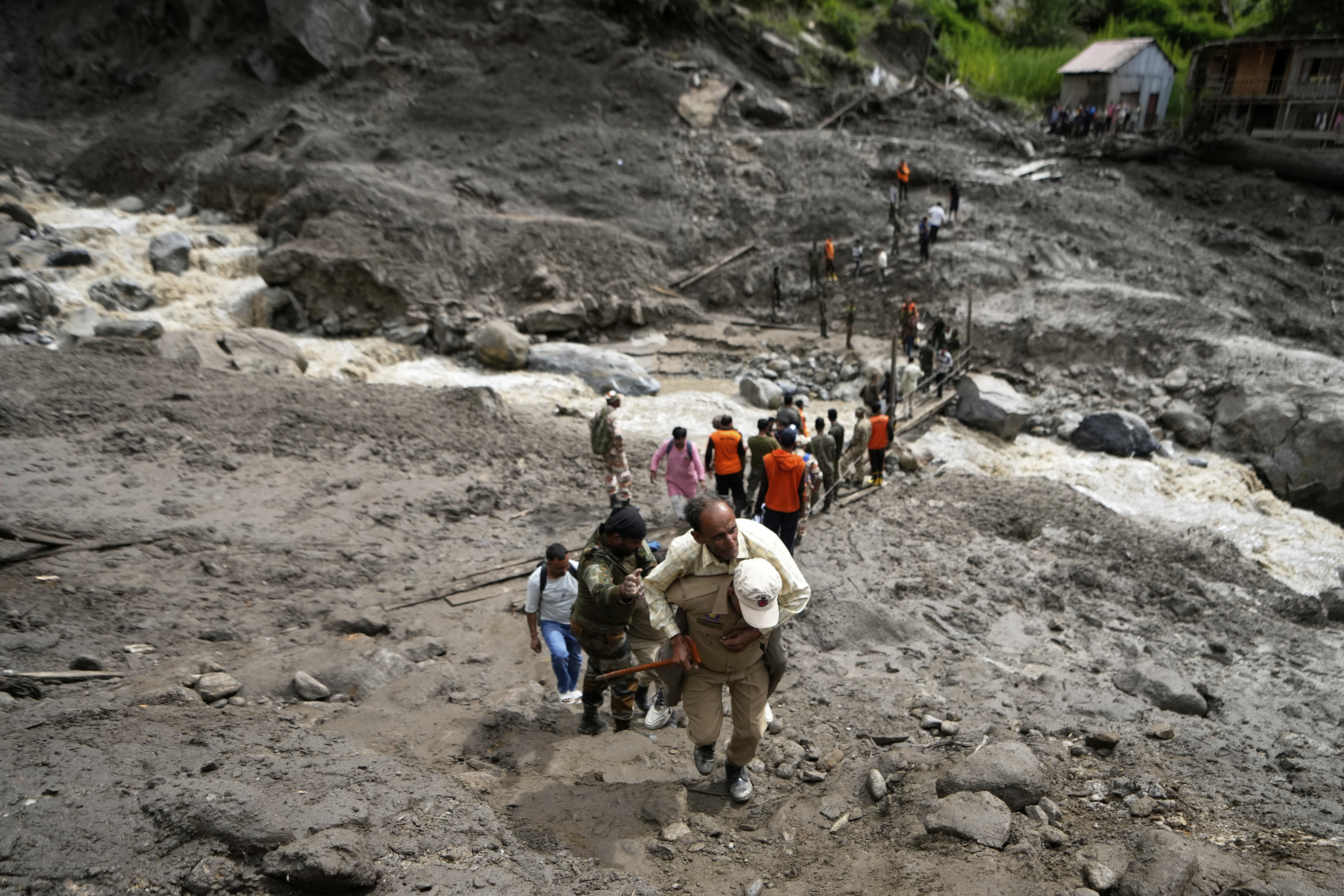Rescuers search for missing flash flood victims in remote Kashmir village