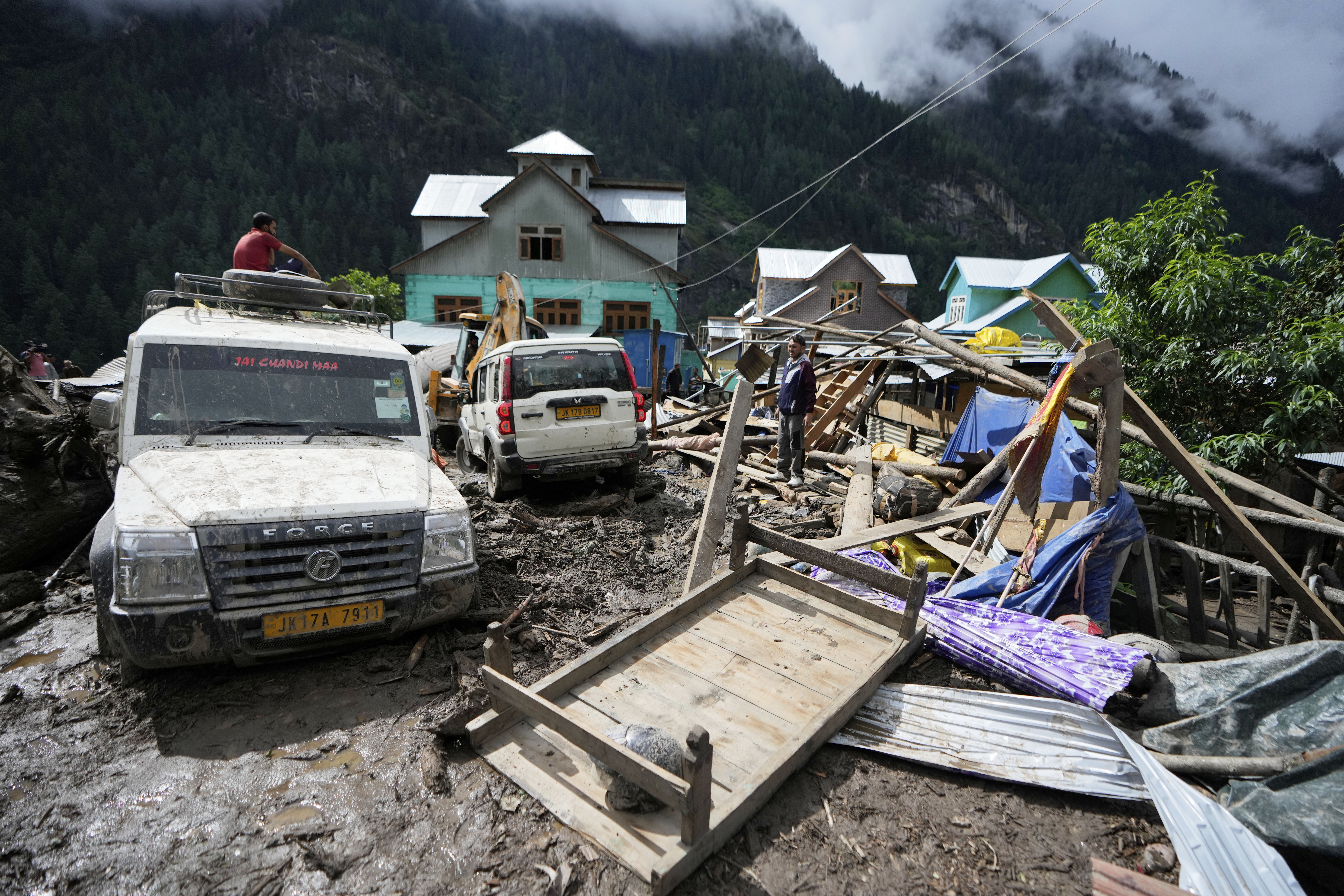 Rescuers search for missing flash flood victims in remote Kashmir village