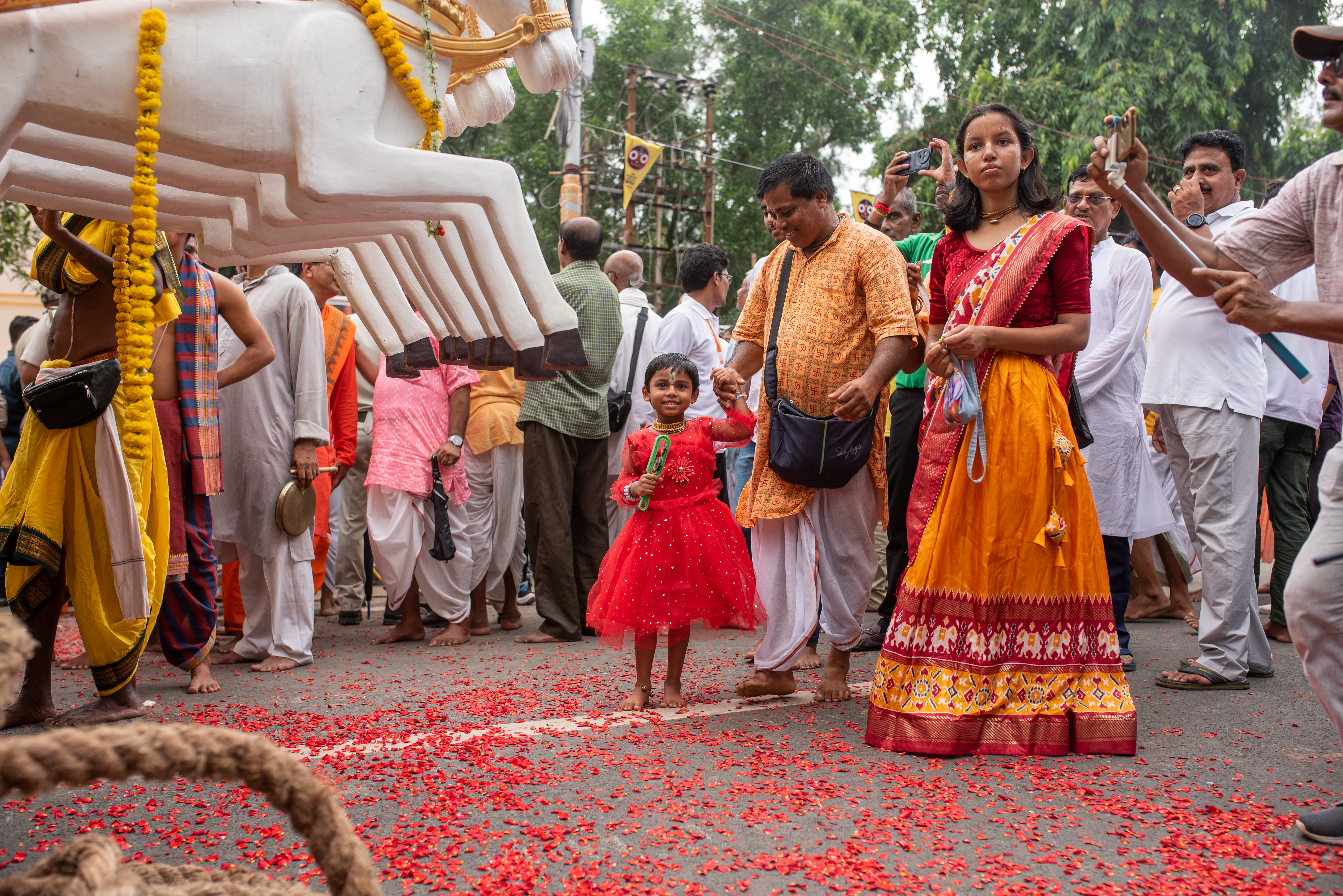 Digha, West Bengal, India; May 5th, 2025 — A young girl, visiting with her family from a nearby city, came to witness the first-ever state-sponsored Rath Yatra festival in Digha. Her family are followers of ISKCON, the organization entrusted by the West Bengal government with arranging and overseeing the event.