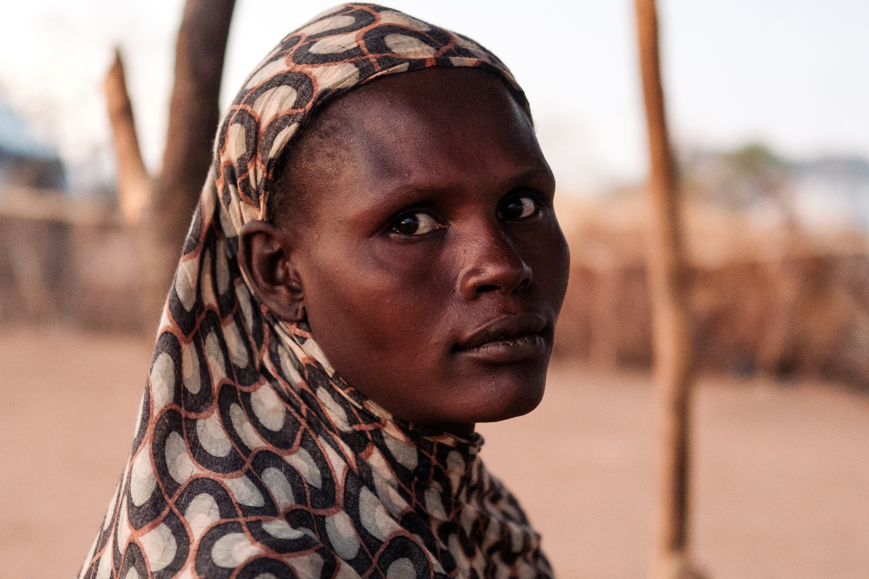 Huda Hamid Ahmad, 31, sits for a photo in her temporary shelter.