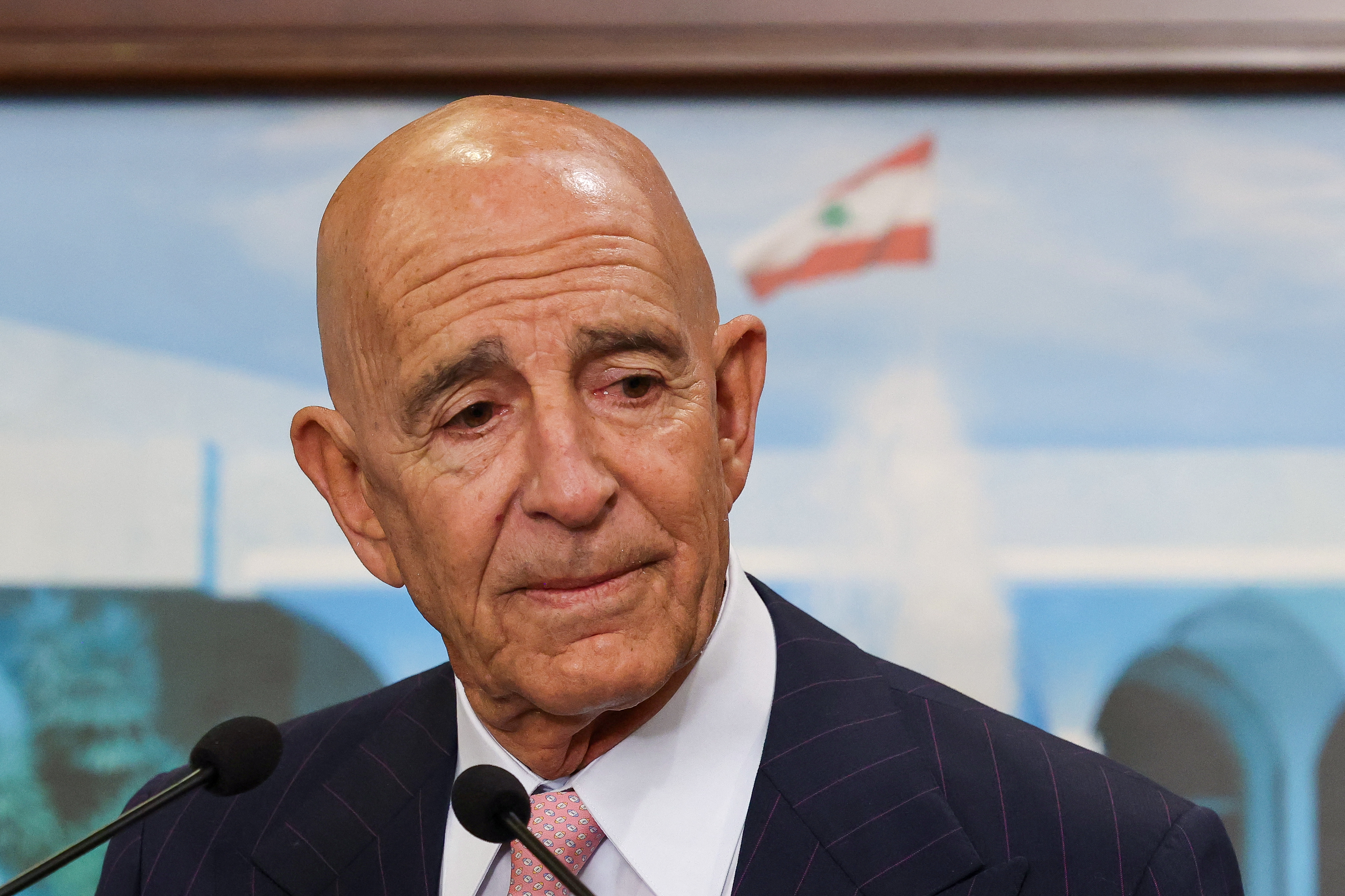 TOPSHOT - US ambassador to Turkey and special envoy for Syria Tom Barrack listens to a question during a joint press conference following his meeting with Lebanon's president at the Presidential Palace in Baabda on August 18, 2025.