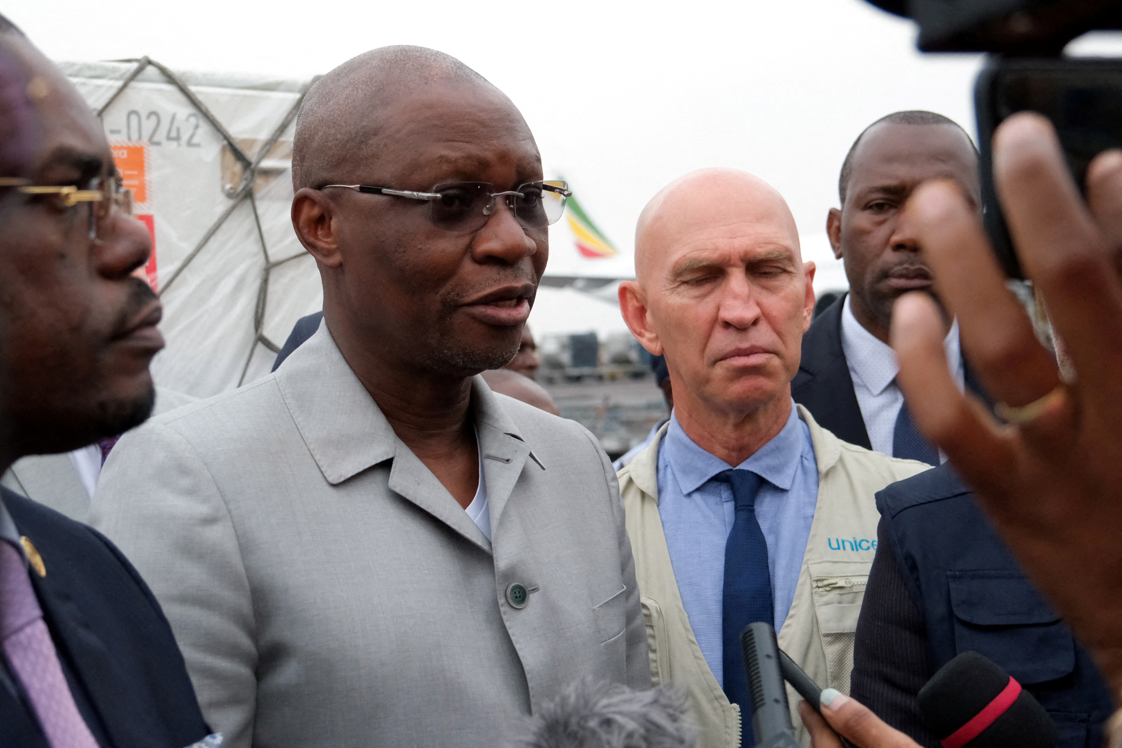 The Democratic Republic of Congo's Health Minister Samuel Roger Kamba Mulamba speaks to the media after receiving first batches of mpox vaccines, at N'Djili International Airport in Kinshasa, Democratic Republic of Congo September 5, 2024. REUTERS/Justin Makangara