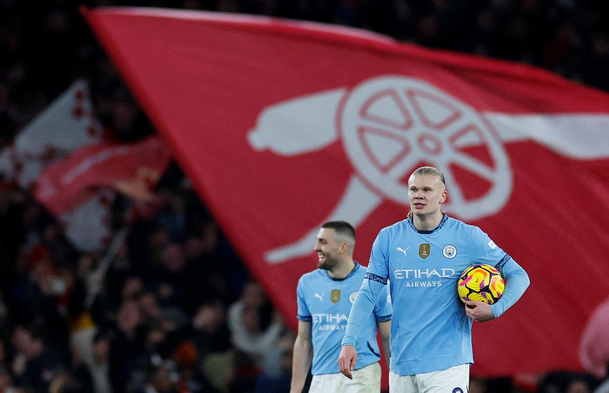 Manchester City's Erling Haaland looks dejected after Arsenal's Thomas Partey scores their second goal