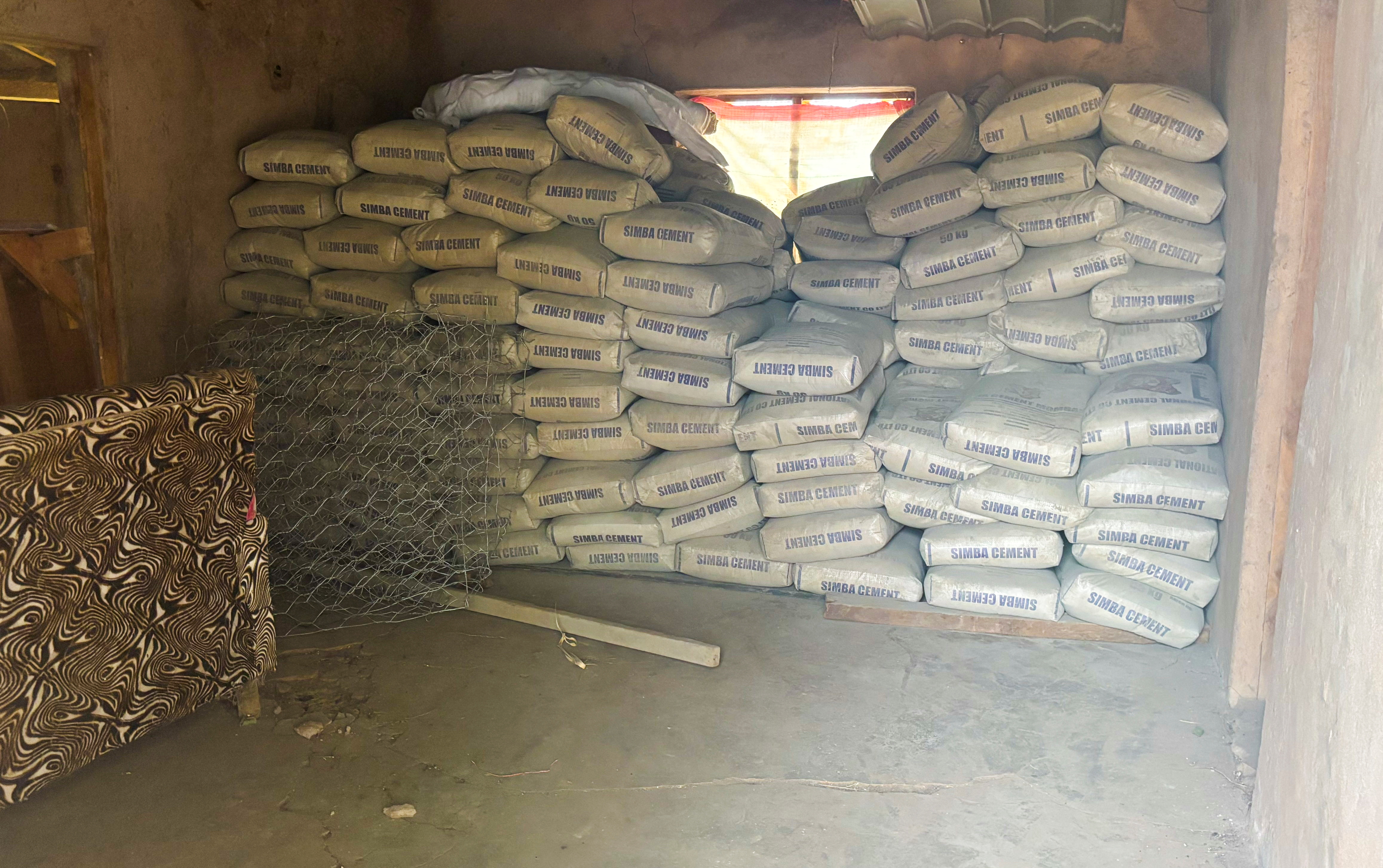 Bags of unused cement are stored at a construction site in Kenya's Taveta county in June following the decision to slash nearly all US foreign aid that has left numerous water and sanitation projects incomplete. [File: Jefferson Kahinju/Reuters]