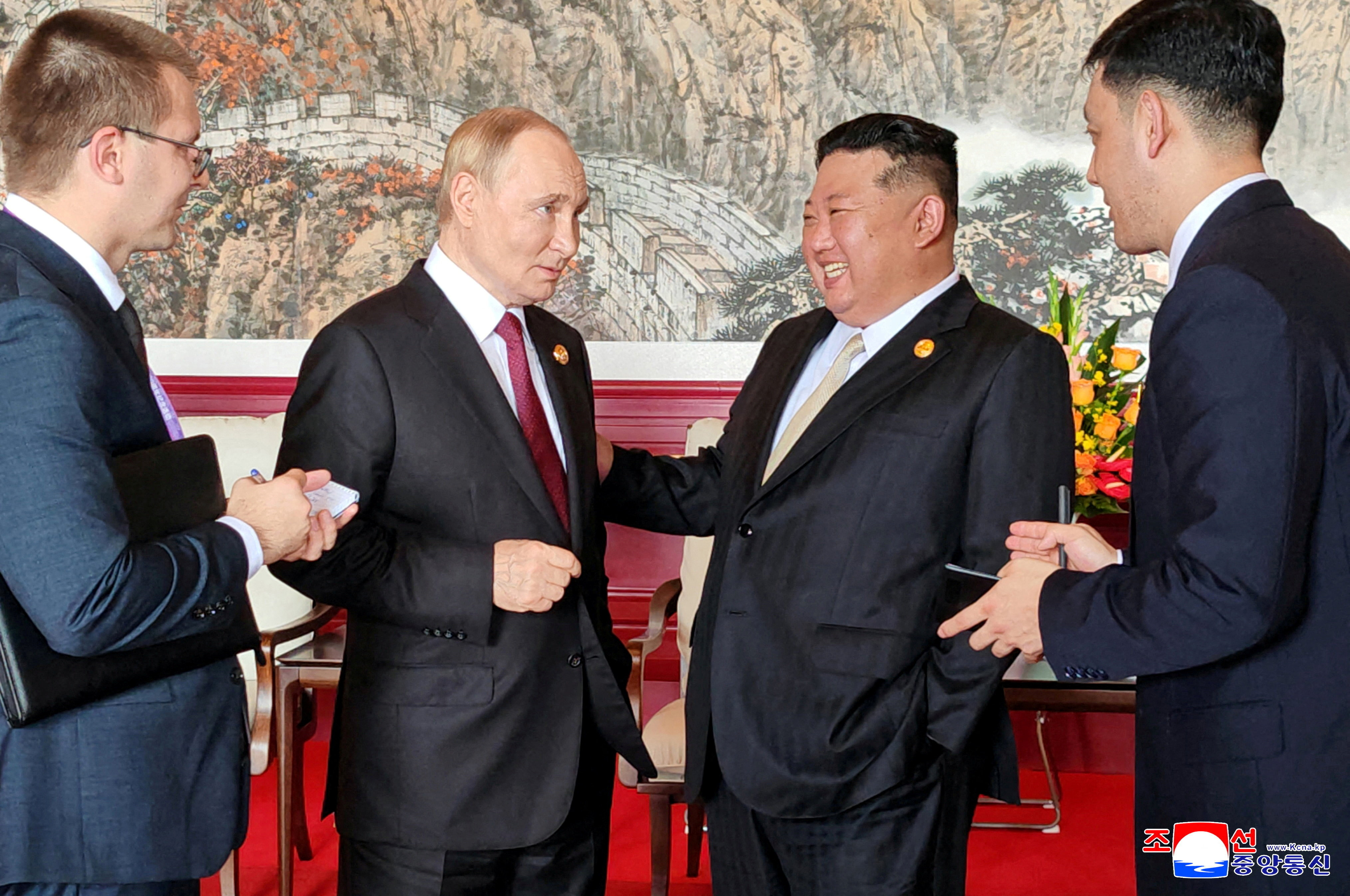 North Korean leader Kim Jong Un speaks with Russian President Vladimir Putin during their visit to Beijing to attend China's commemoration of the 80th anniversary of the end of World War Two, in Beijing, China, September 3, 2025, in this picture released by the Korean Central News Agency. KCNA via REUTERS ATTENTION EDITORS - THIS IMAGE WAS PROVIDED BY A THIRD PARTY. REUTERS IS UNABLE TO INDEPENDENTLY VERIFY THIS IMAGE. NO THIRD PARTY SALES. SOUTH KOREA OUT. NO COMMERCIAL OR EDITORIAL SALES IN SOUTH KOREA.