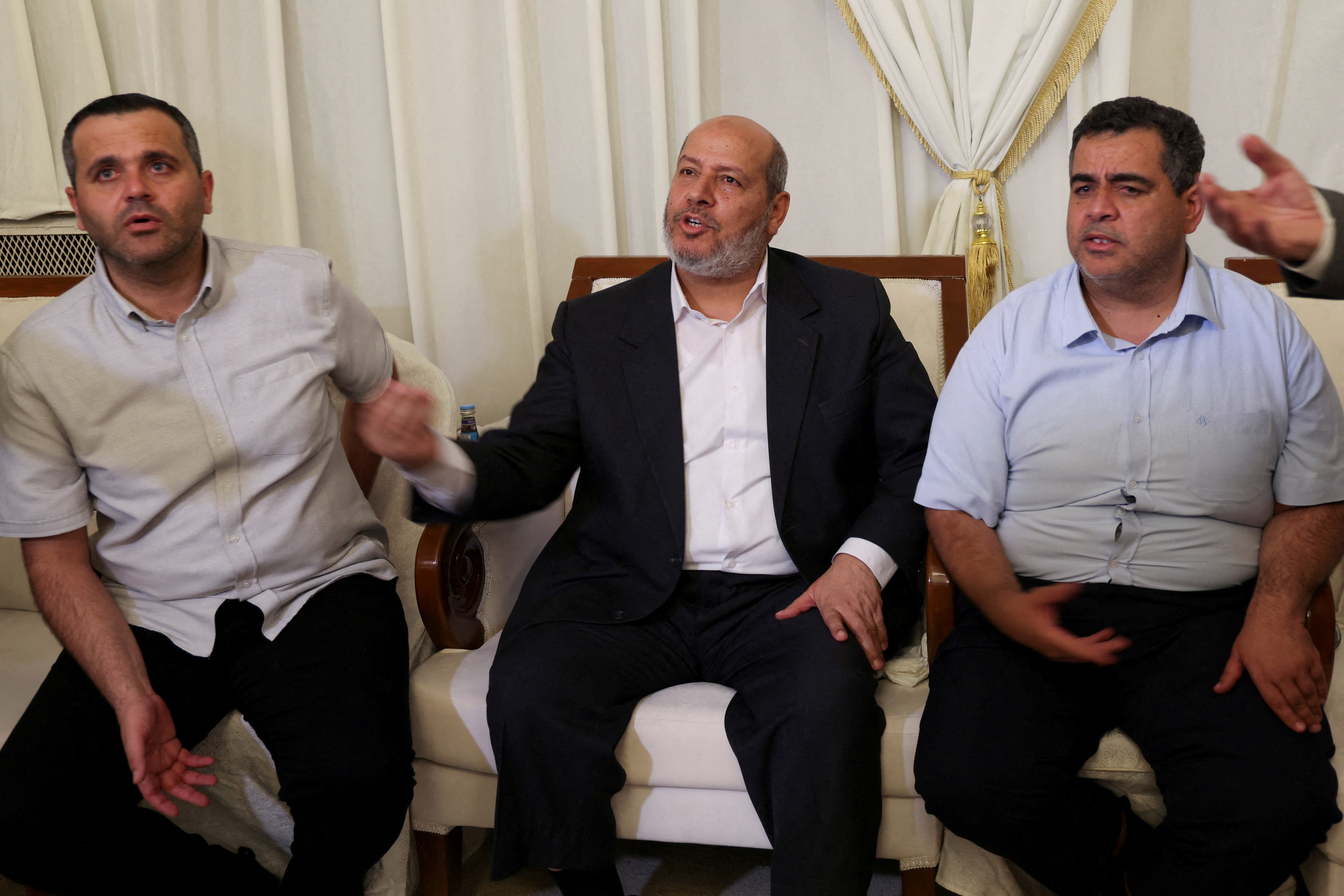 Hamas official Khalil Al-Hayya sits at a mourning house for assassinated Hamas chief Ismail Haniyeh