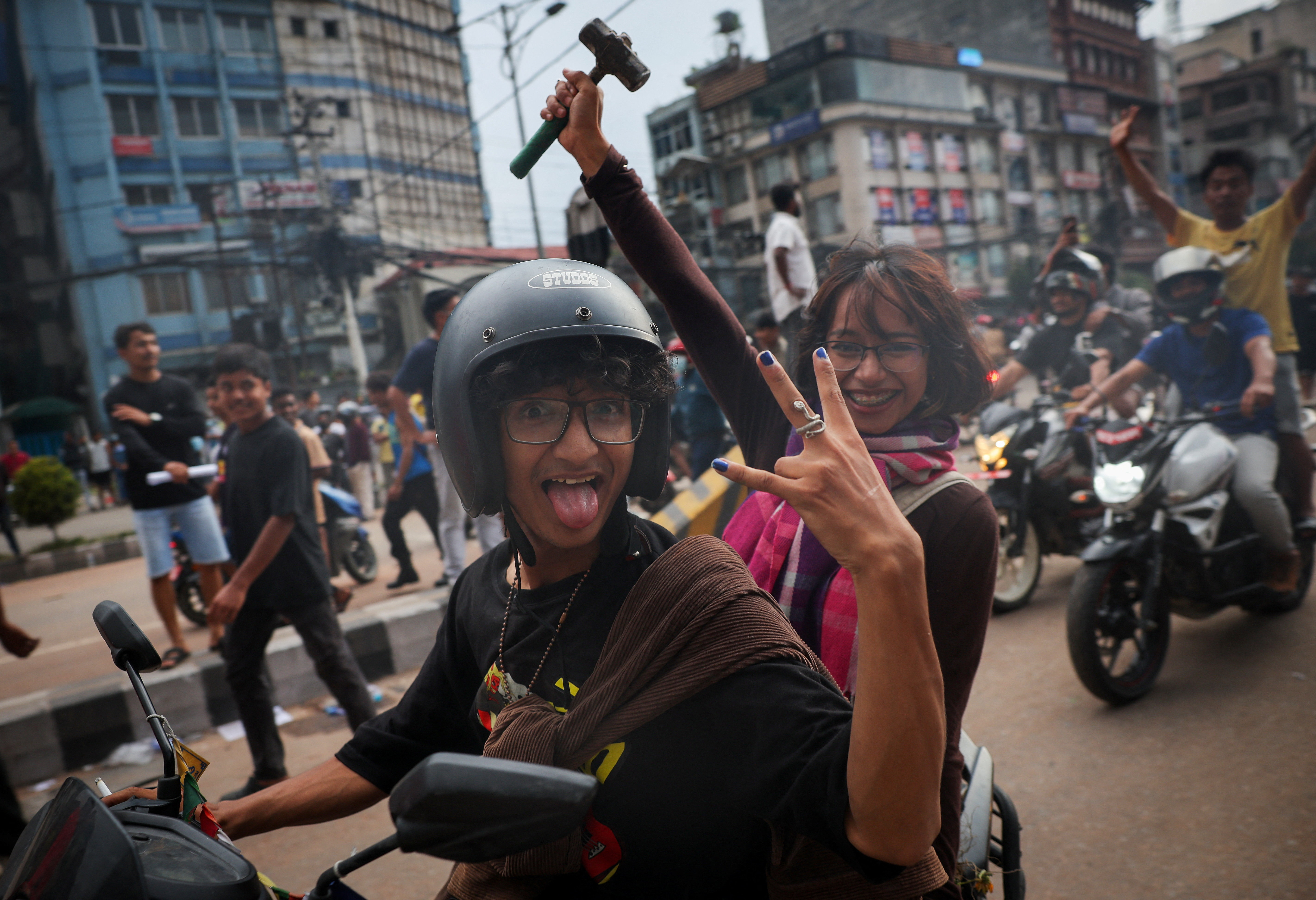 Demonstrators celebrate outside the Parliament complex in Kathmandu, Nepal, September 9, 2025 [Adnan Abidi/Reuters]