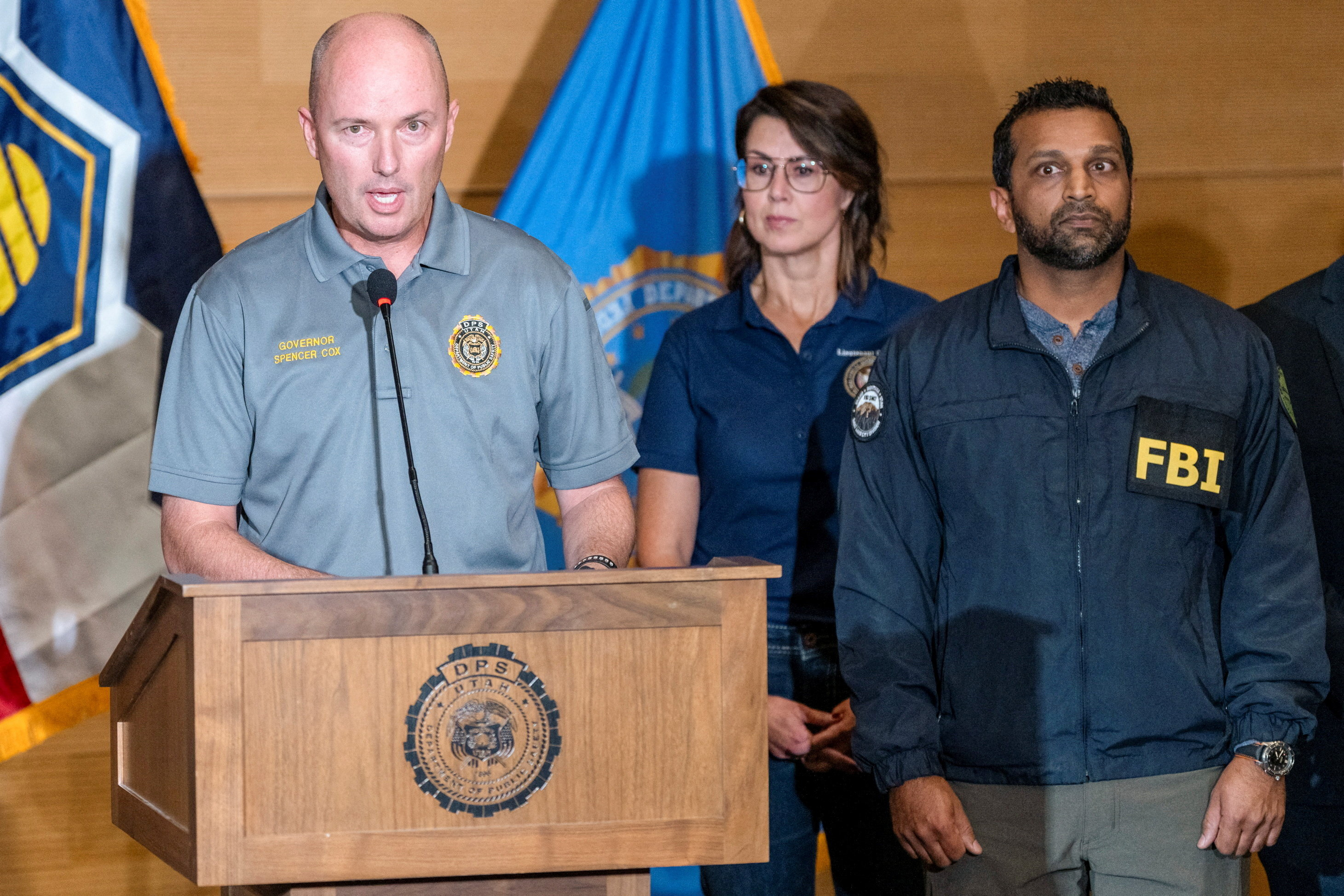 Utah Governor Spencer Cox speaks at a press conference, near FBI Director Kash Patel, at the Utah Valley University, after U.S. right-wing activist and commentator, Charlie Kirk, an ally of U.S. President Donald Trump, was fatally shot during an event at the university, in Orem, Utah, U.S. September 11, 2025. REUTERS/Cheney Orr TPX IMAGES OF THE DAY