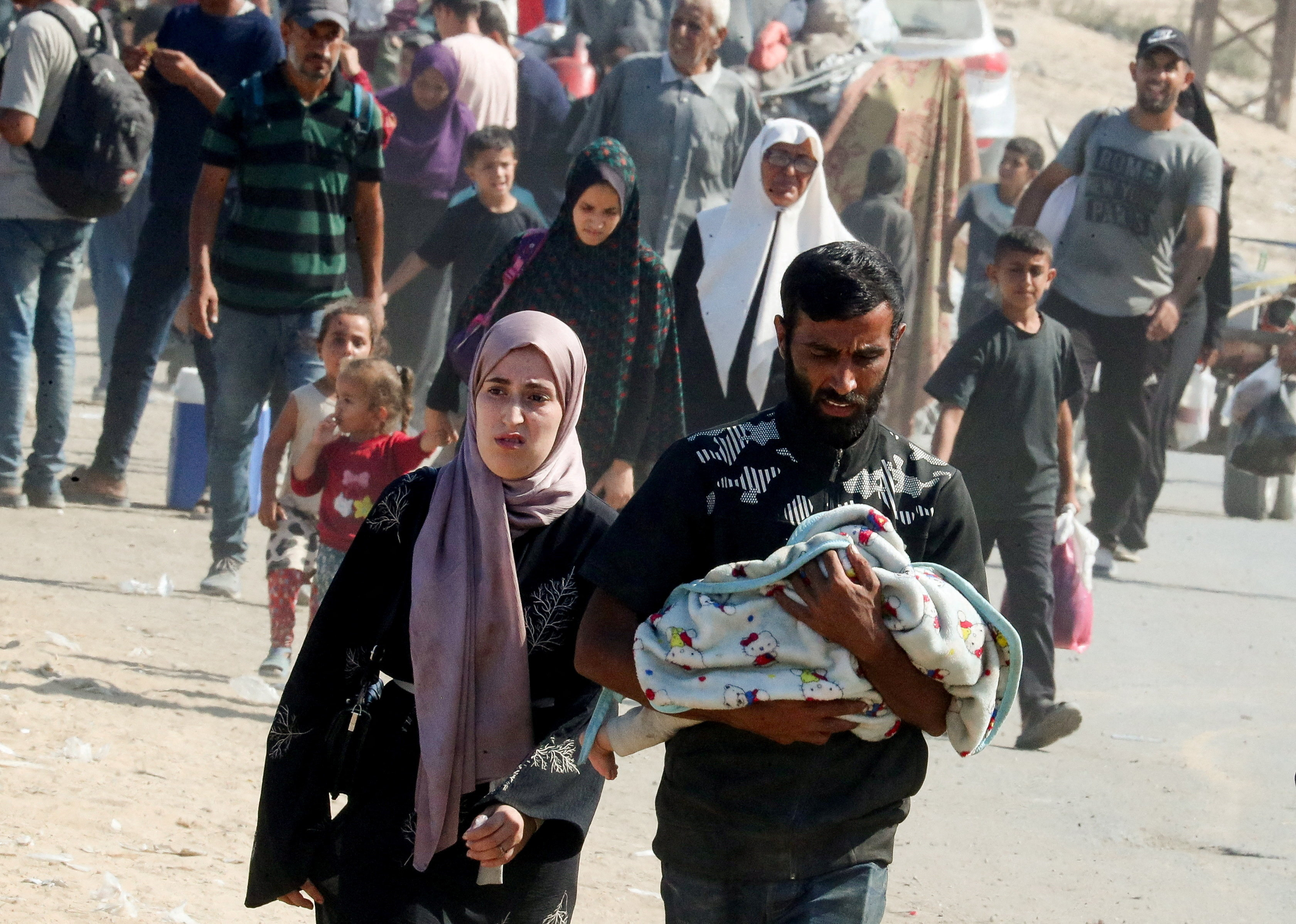 Displaced Palestinians, fleeing northern Gaza due to an Israeli military operation