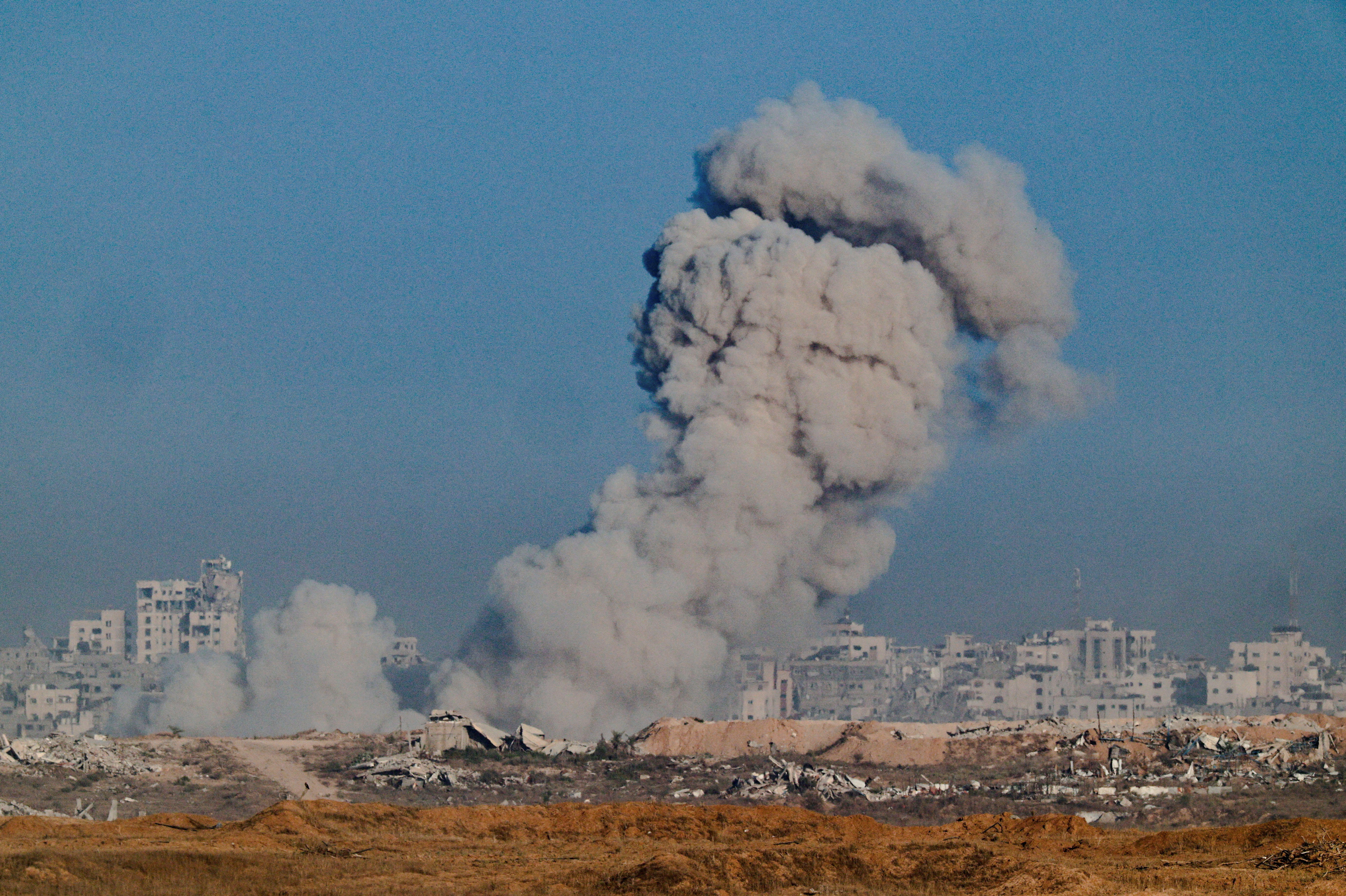 Smoke rises from Gaza after an explosion, as seen from Israel