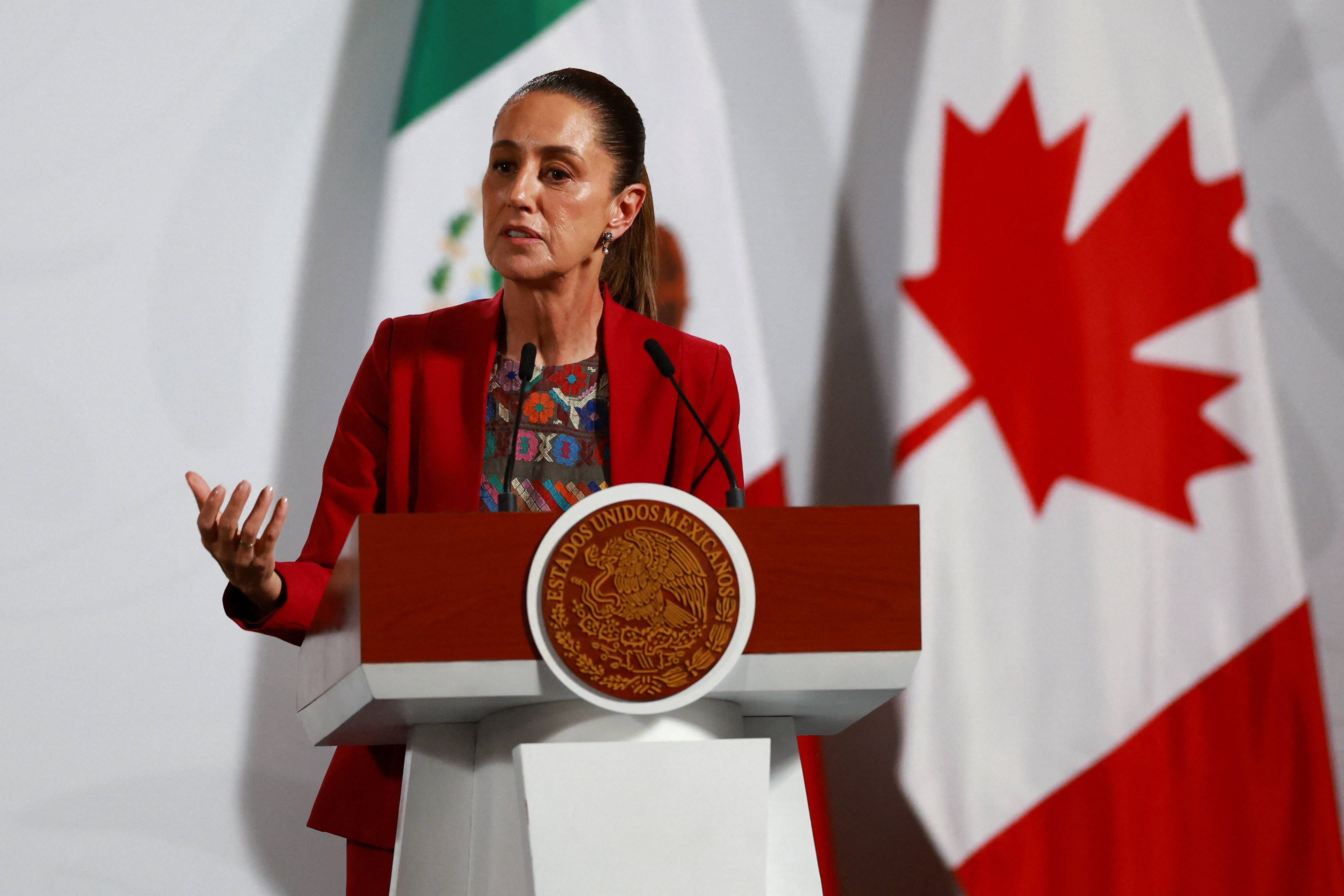 Mexican President Claudia Sheinbaum speaks during a press conference with Canadian Prime Minister Mark Carney (not pictured) at the National Palace, in Mexico City, Mexico September 18, 2025. (Raquel Cunha / Reuters)