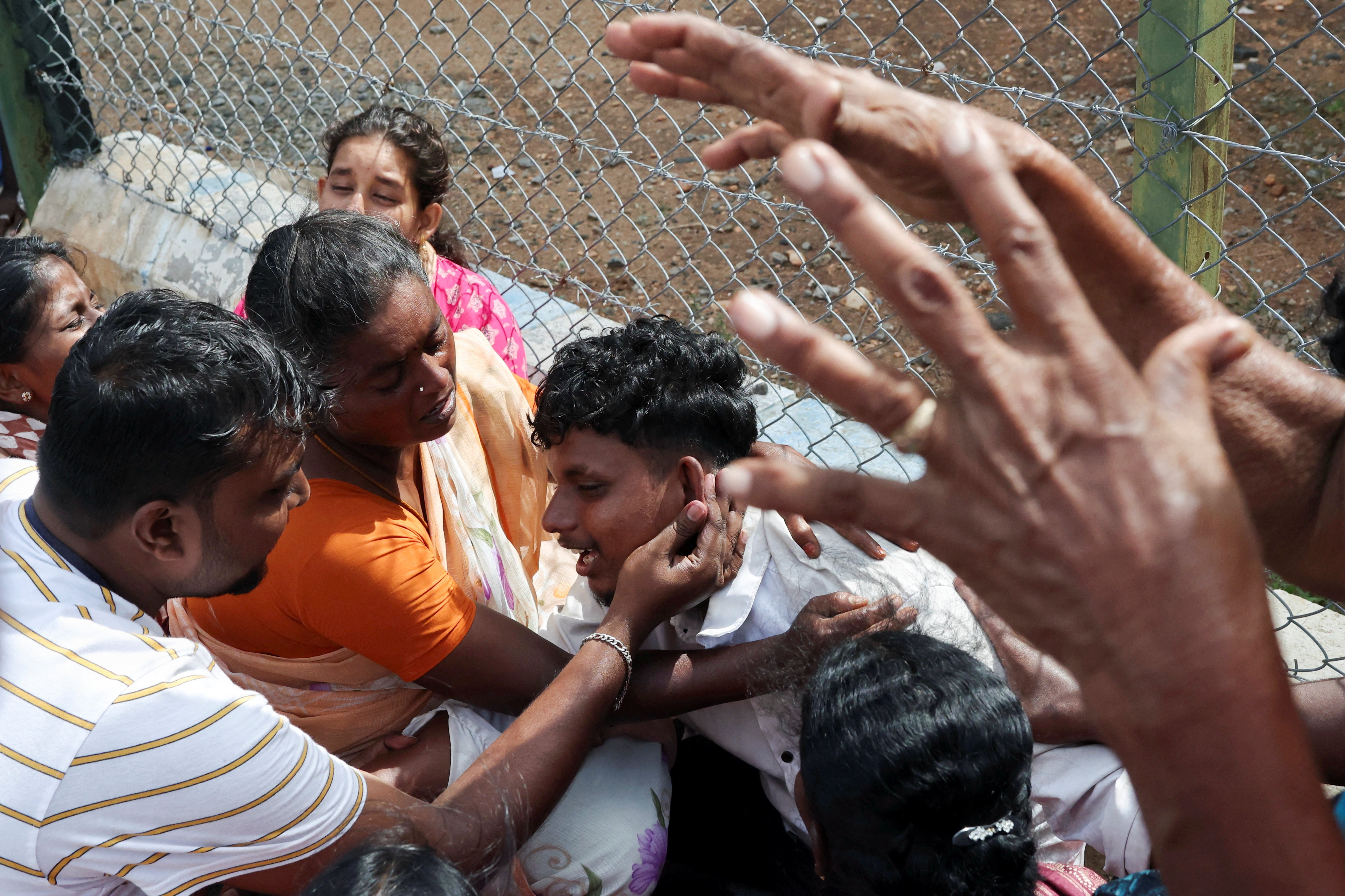 Santosh, who lost his seven-year old child in a stampede at an election campaign rally held by Tamilaga Vettri Kazhagam, burst into tears in front of Karur Government Medical College as he arrives to receive the body, in Karur, Tamil Nadu, India, September 28, 2025. REUTERS/Priyanshu Singh