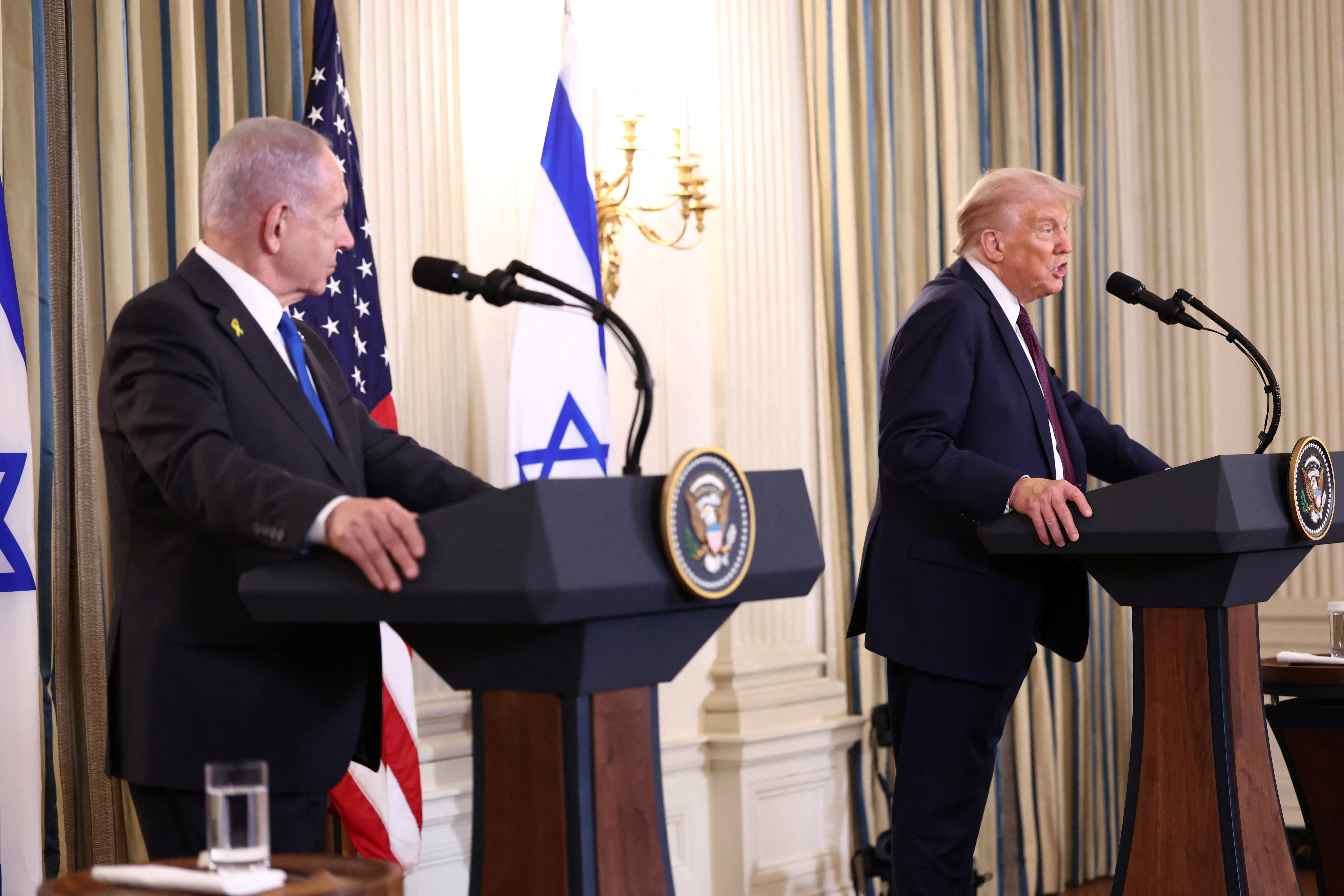 US President Donald Trump and Israeli Prime Minister Benjamin Netanyahu hold a joint press conference in the State Dining Room at the White House, in Washington, DC, September 29, 2025. [Kevin Lamarque/Reuters]