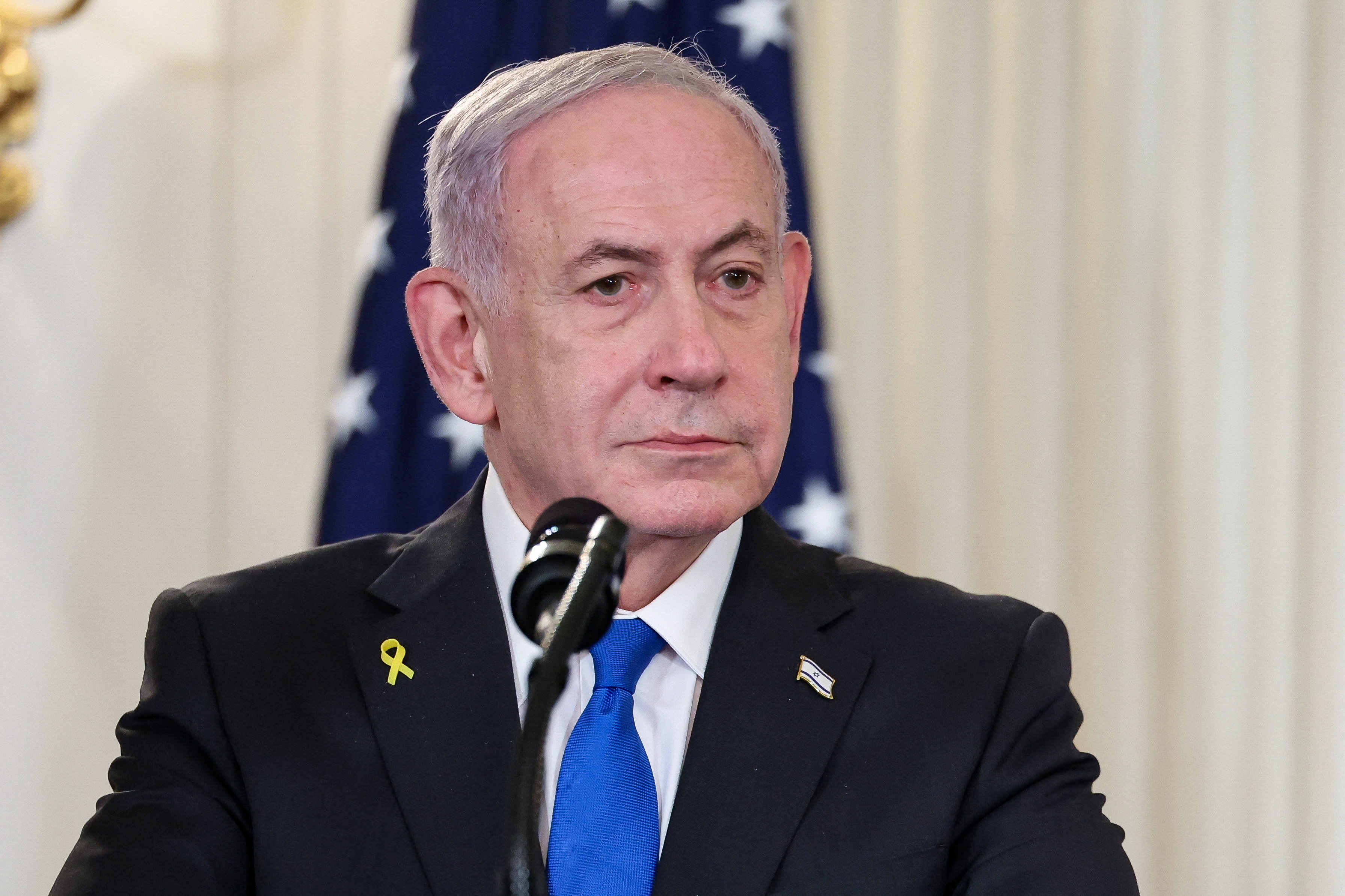 During a visit to the White House Israeli Prime Minister Benjamin Netanyahu called Qatar's prime minister and apologised for Israel's air strikes on Doha this month [Jonathan Ernst/Reuters]