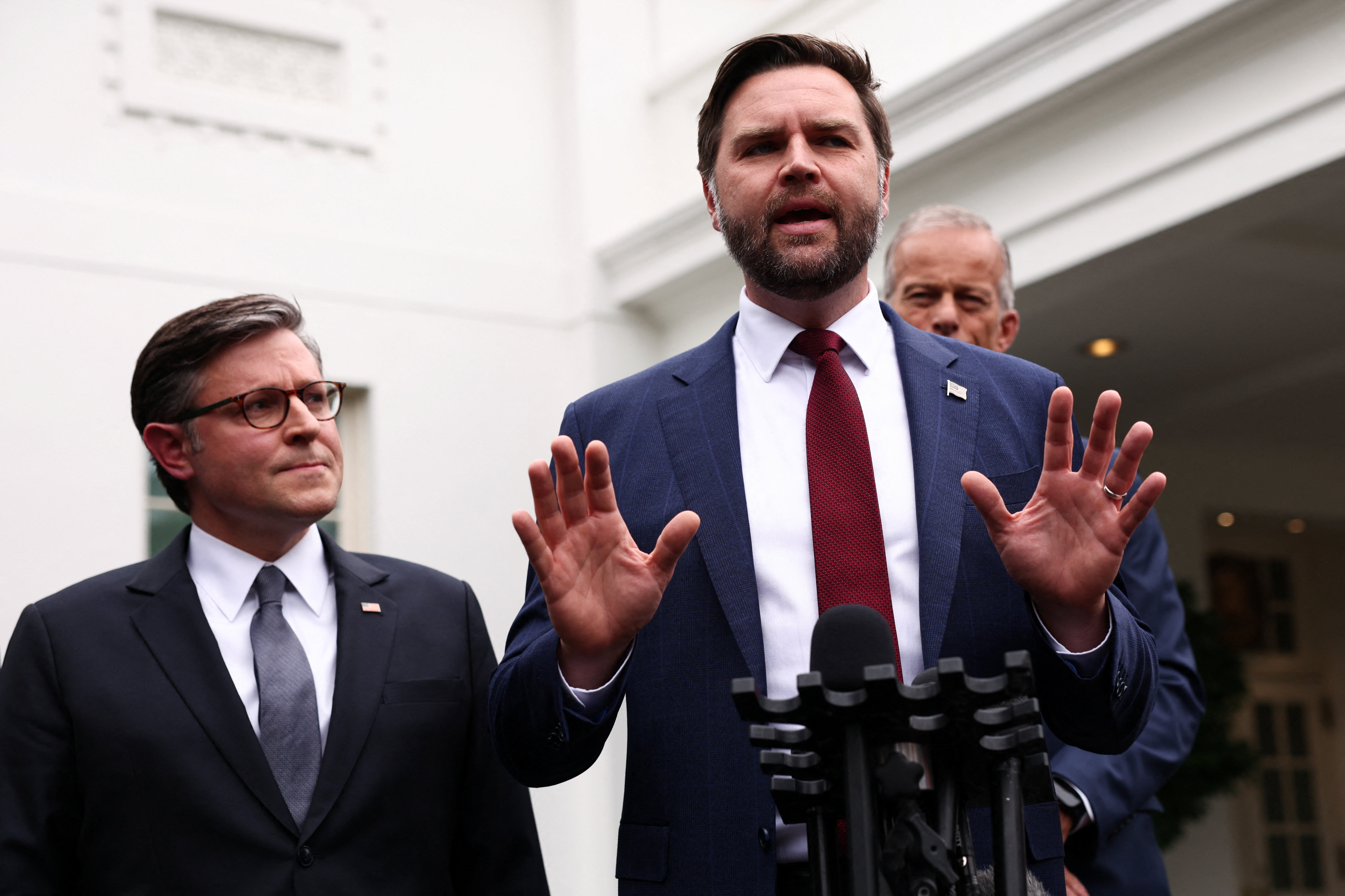 US Vice President JD Vance speaks to the media next to Speaker of the House Mike Johnson and Senate Majority Leader John Thune (R-SD).