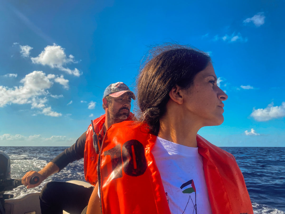 Woman and man on dinghy