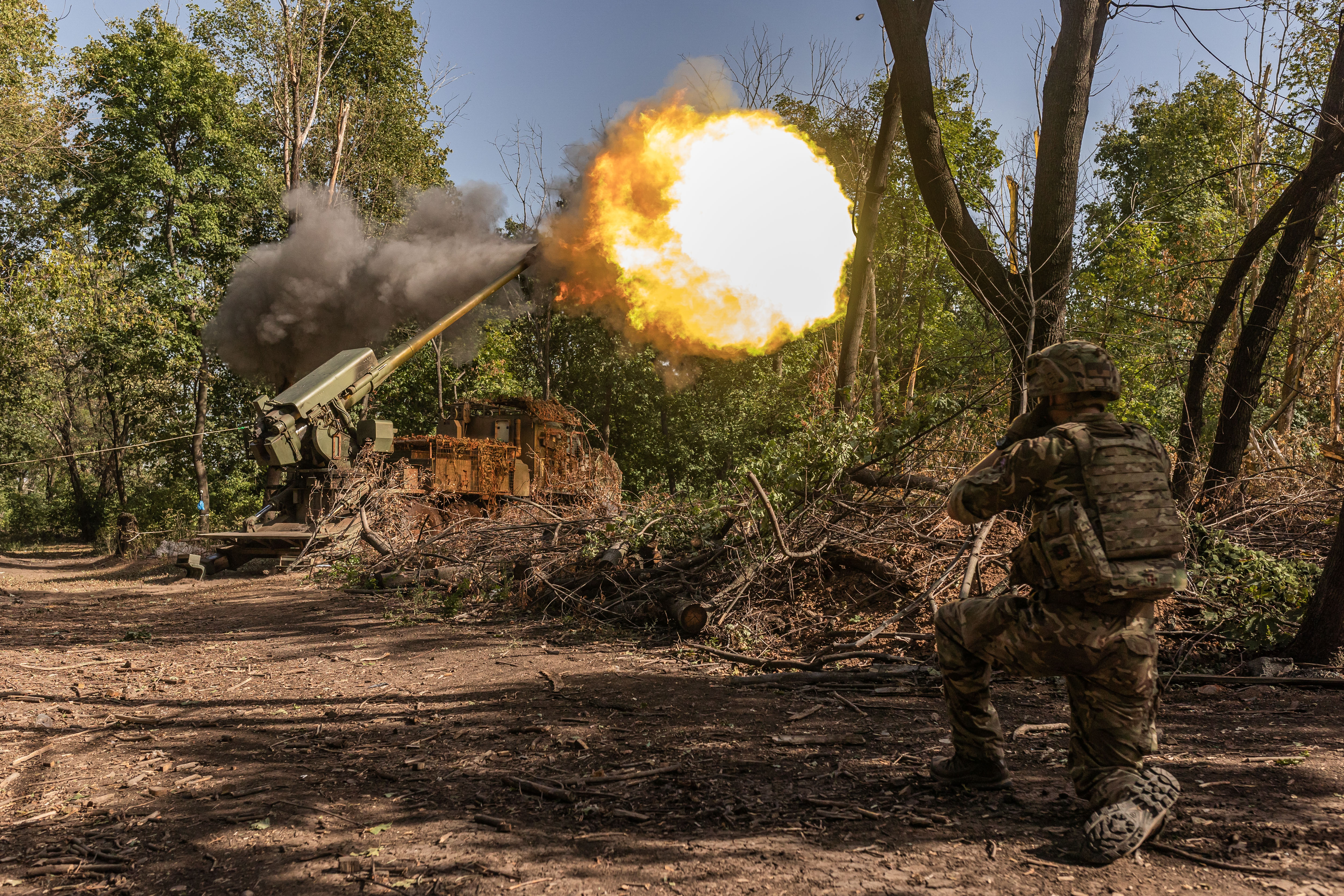 Ukrainian soldiers fire the Ukrainian artillery piece ‘Bohdana’ from their artillery position in the direction of Toretsk, Ukraine