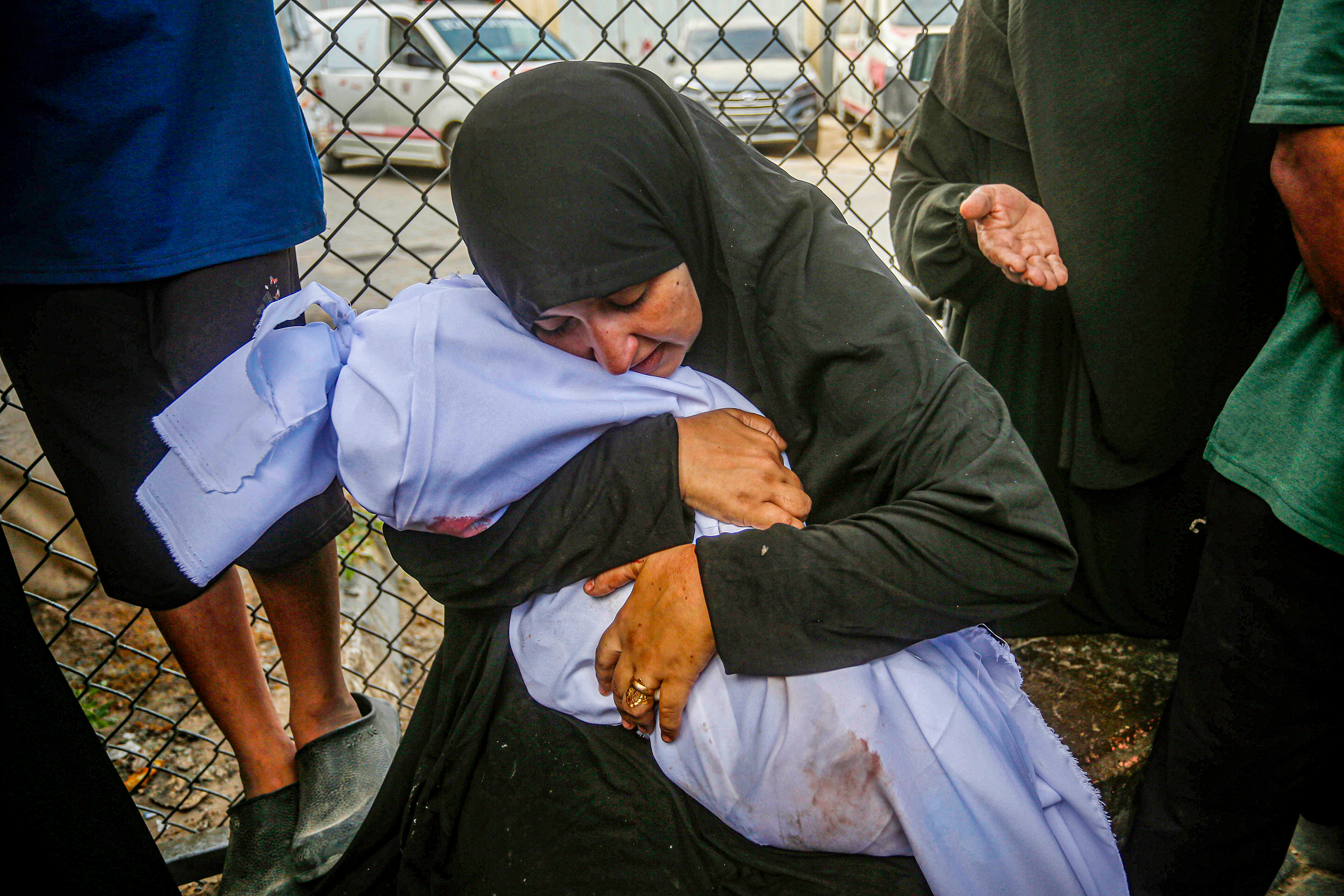 DEIR AL-BALAH, GAZA - SEPTEMBER 22: The bodies of the Palestinians are taken to Al-Aqsa Martyrs Hospital for funeral procedures, while grieving relatives mourned their loss in Deir al-Balah, Gaza on September 22, 2025. The Israeli army carried out an attack on a tent sheltering displaced Palestinians located in the central Gaza Strip. Reports stated that several people were killed in the strike. ( Mohammed Nassar - Anadolu Agency )