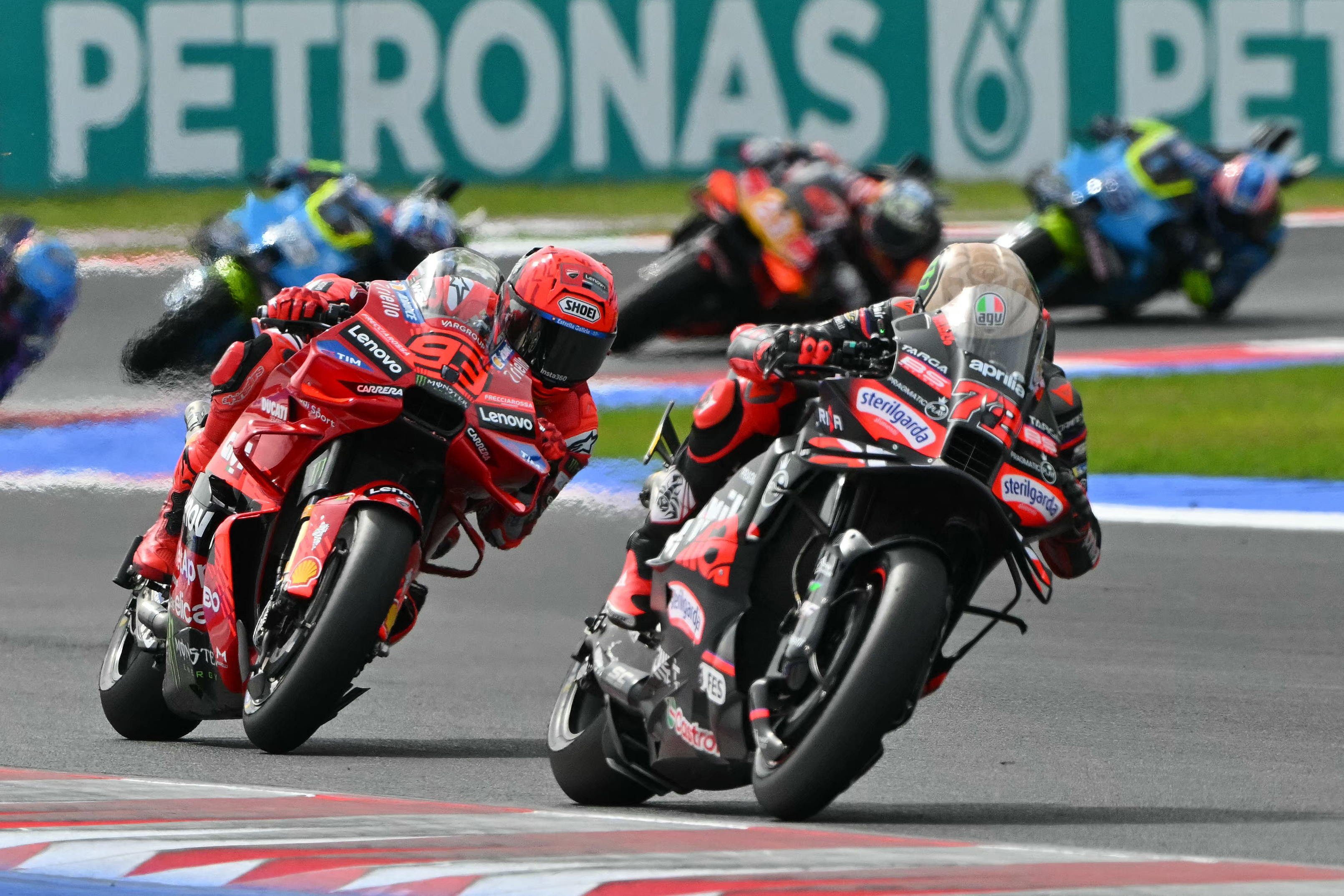 Marc Marque and Marco Bezzecchi in action.