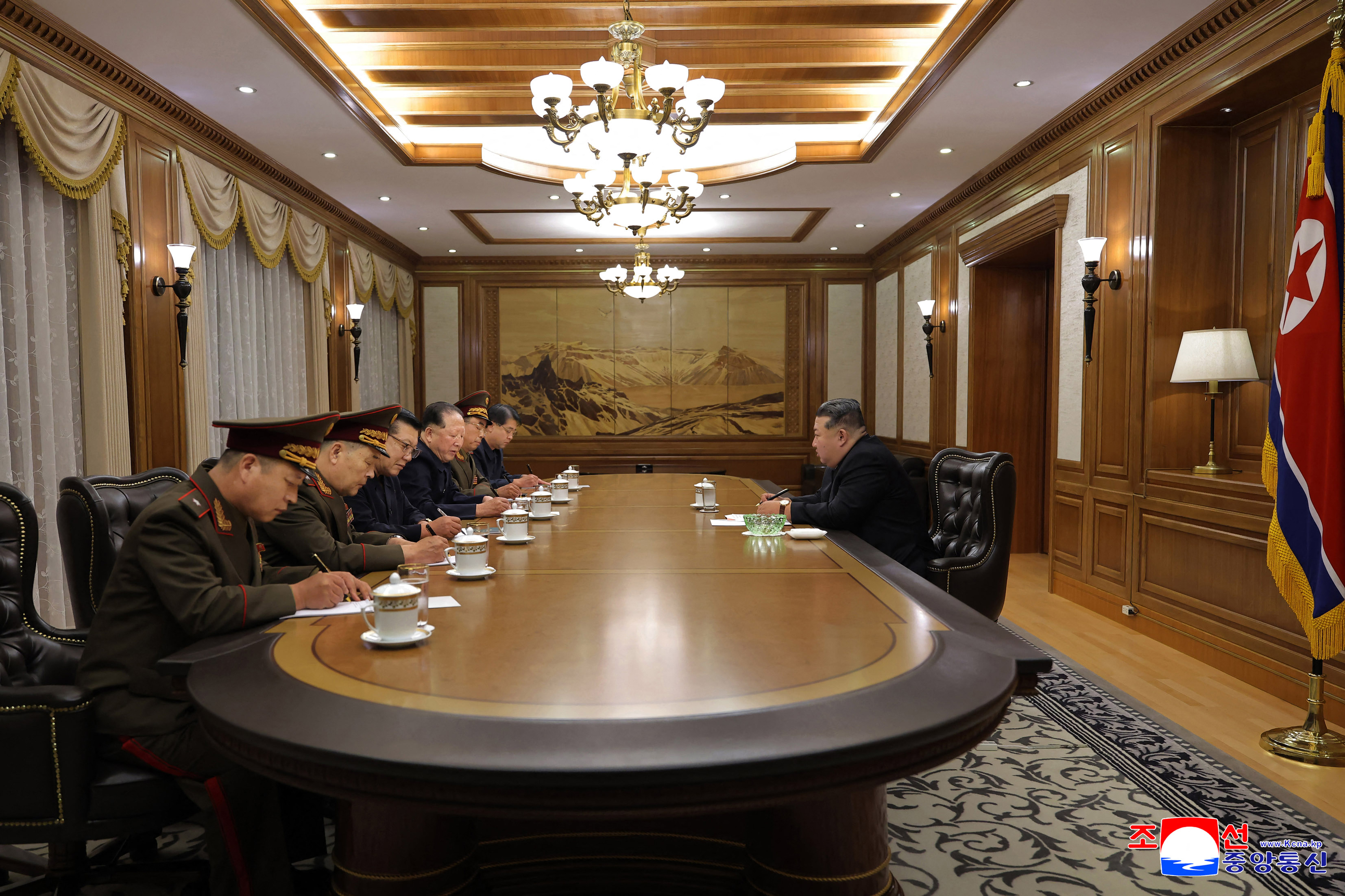 This picture taken on September 26, 2025 and released from North Korea's official Korean Central News Agency (KCNA) on September 27, 2025 shows North Korean leader Kim Jong Un attending a consultation meeting on nuclear materials and nuclear weapons production with scientists and engineers from the Nuclear Weapons Institute and nuclear-related fields, at an undisclosed location in North Korea. (Photo by KCNA VIA KNS / AFP) / South Korea OUT / SOUTH KOREA OUT / SOUTH KOREA OUT / ---EDITORS NOTE--- RESTRICTED TO EDITORIAL USE - MANDATORY CREDIT "AFP PHOTO/KCNA VIA KNS" - NO MARKETING NO ADVERTISING CAMPAIGNS - DISTRIBUTED AS A SERVICE TO CLIENTS / THIS PICTURE WAS MADE AVAILABLE BY A THIRD PARTY. AFP CAN NOT INDEPENDENTLY VERIFY THE AUTHENTICITY, LOCATION, DATE AND CONTENT OF THIS IMAGE --- /