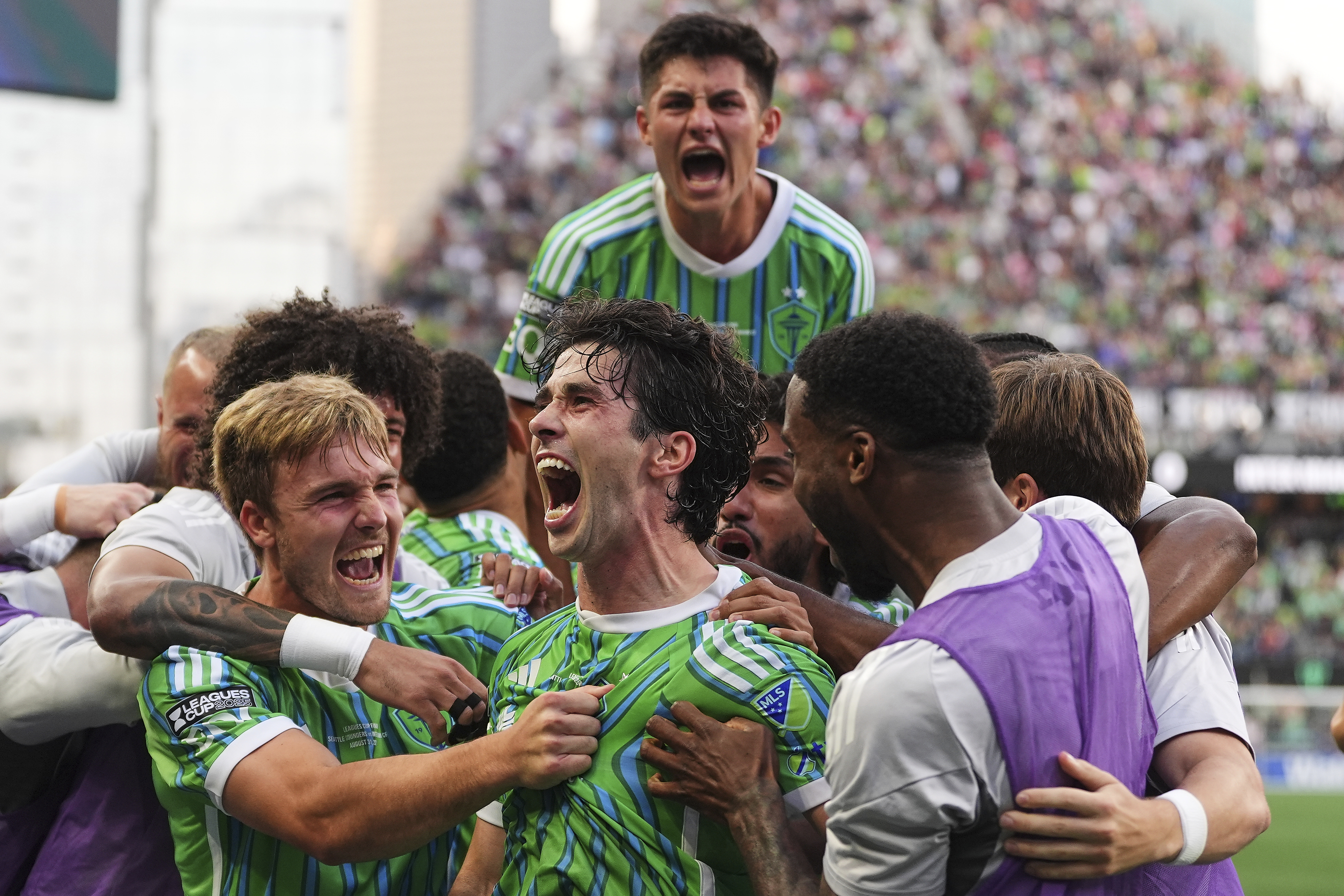 Paul Rothrock, centre, reacts.