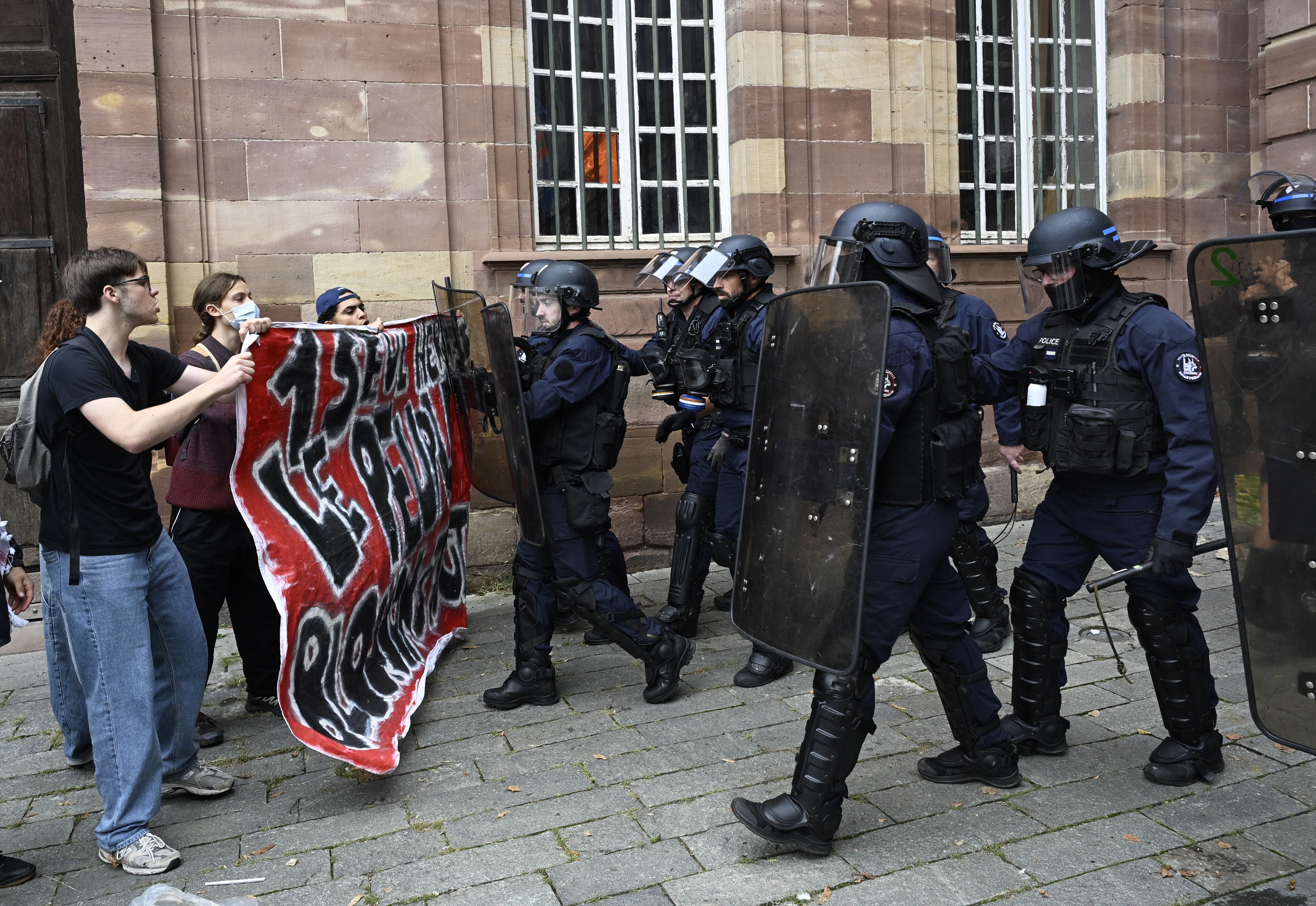 France's streets ablaze as anti-government protests paralyze daily life