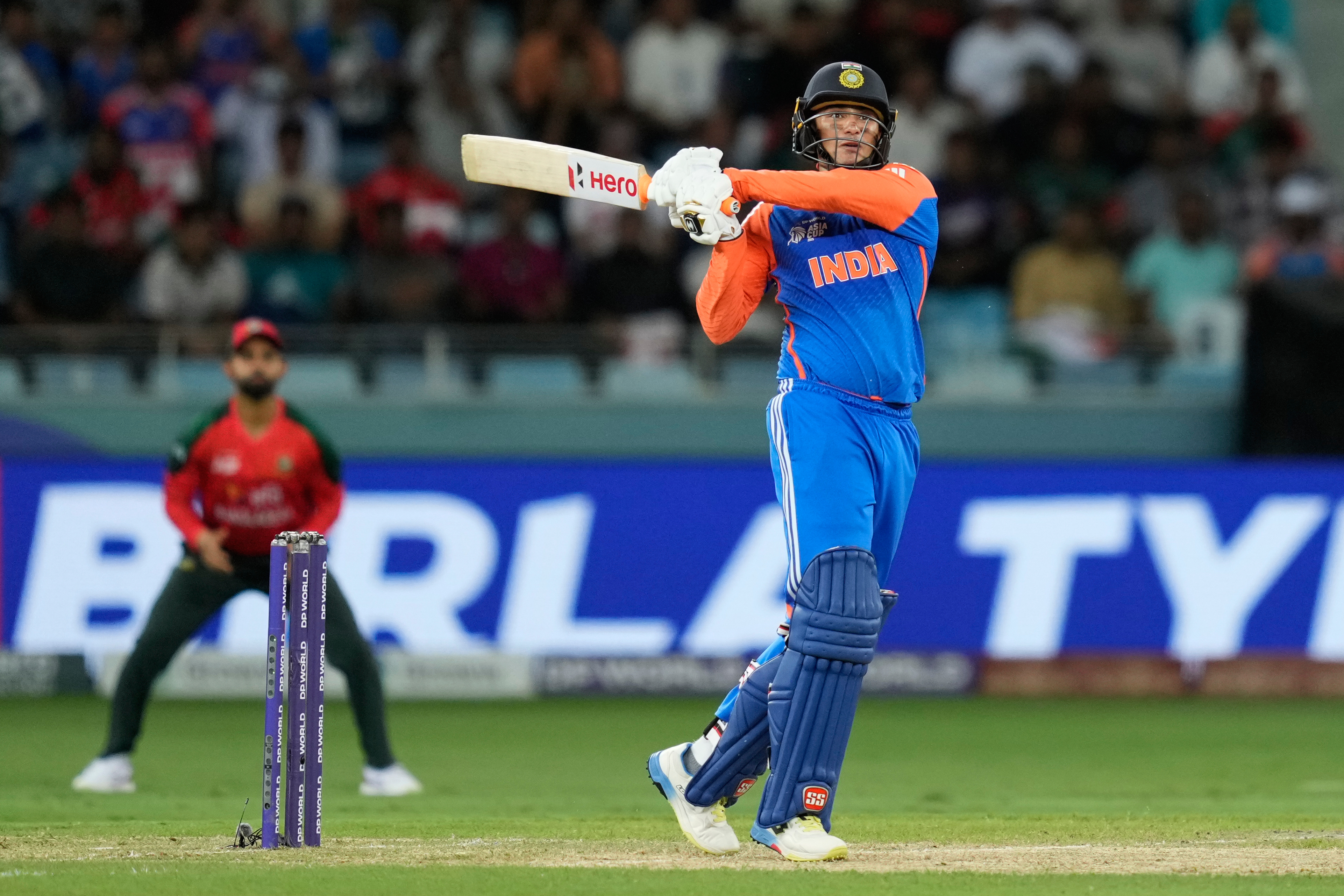 India's Abhishek Sharma plays a shot during the Asia Cup cricket match between India and Bangladesh at Dubai International Cricket Stadium