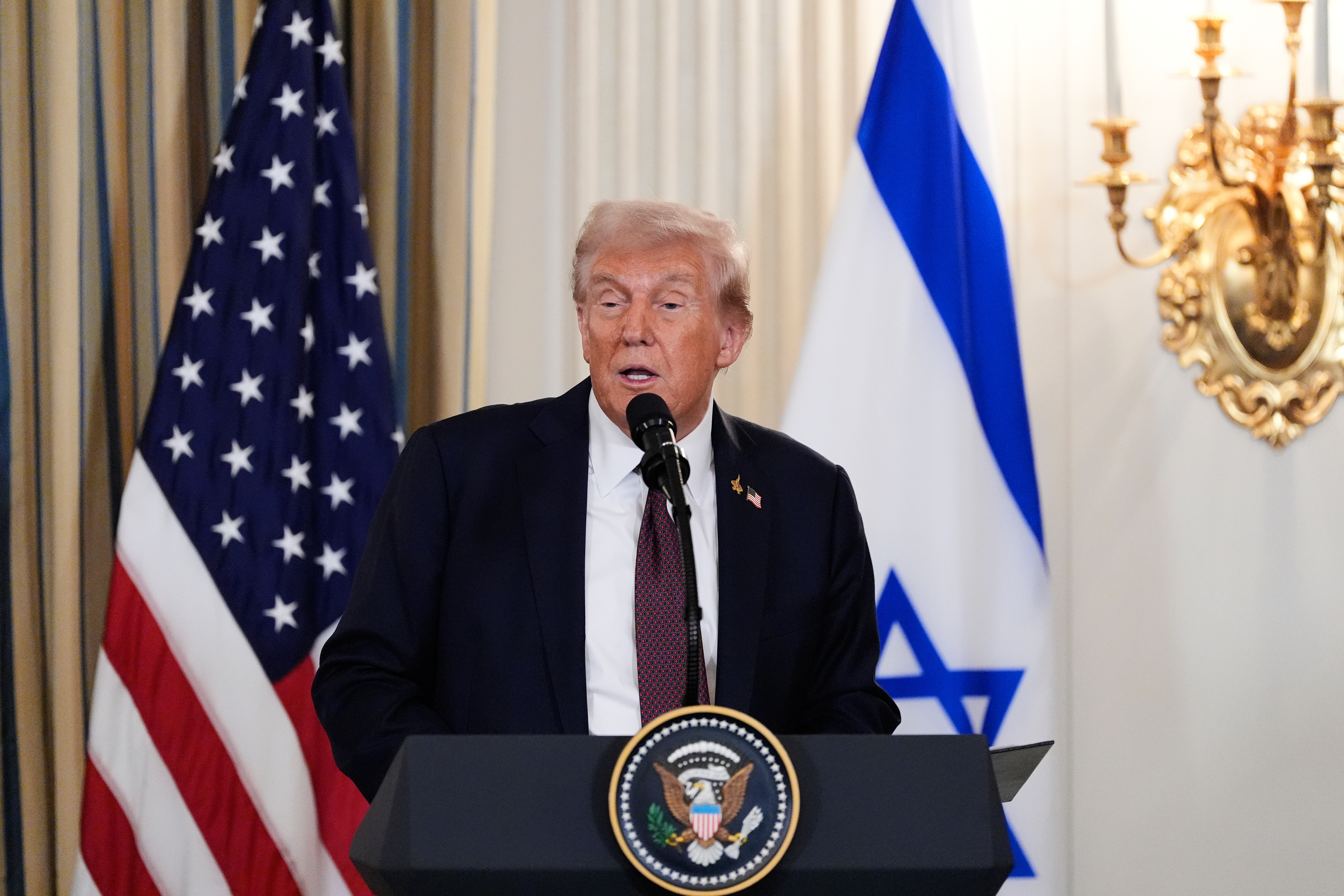 President Donald Trump speaks during a news conference