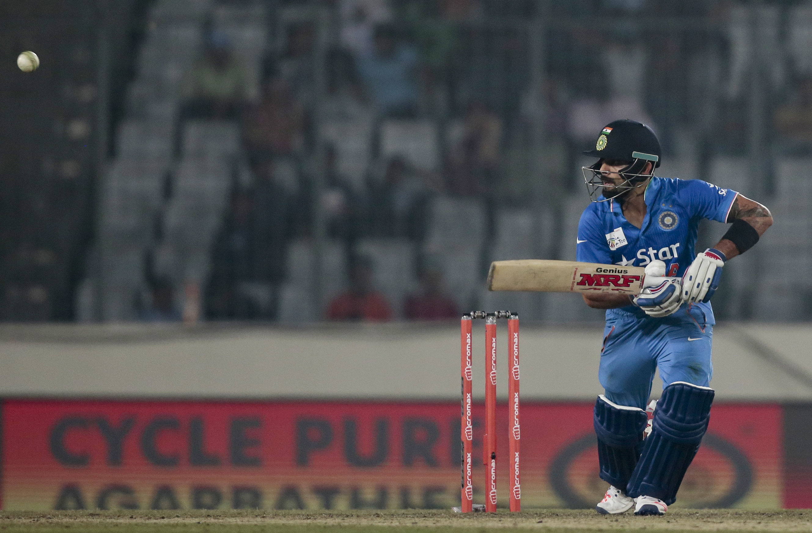 Indias Virat Kohli plays a shot during the Asia Cup Twenty20 international cricket match against Pakistan in Dhaka, Bangladesh, Saturday, Feb. 27, 2016. (AP Photo/A.M. Ahad)