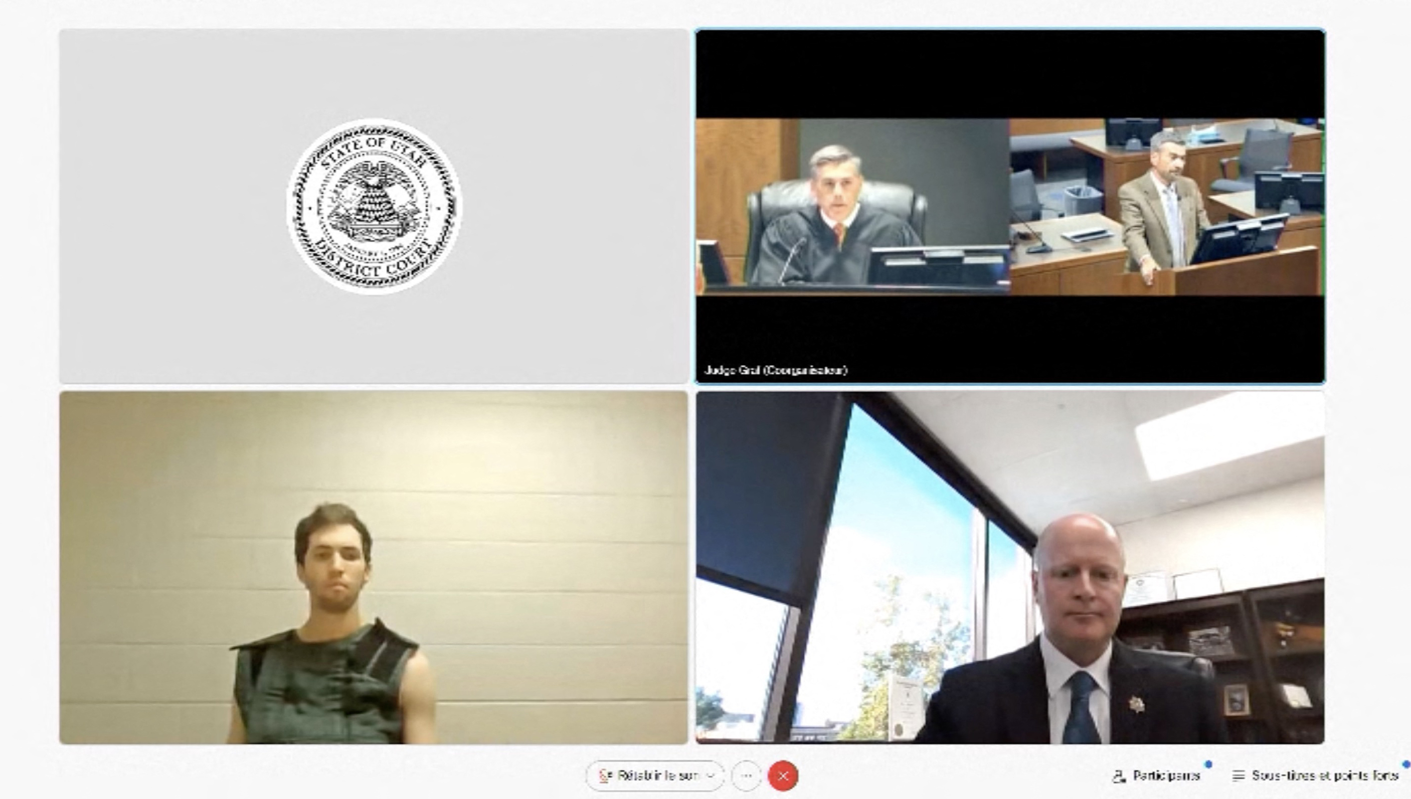 This screengrab from the Utah Court live streaming shows Tyler Robinson (bottom left), the suspect in the killing of political activist Charlie Kirk, attending a court appearance remotely from his jail cell in Provo, Utah, on September 16, 2025.