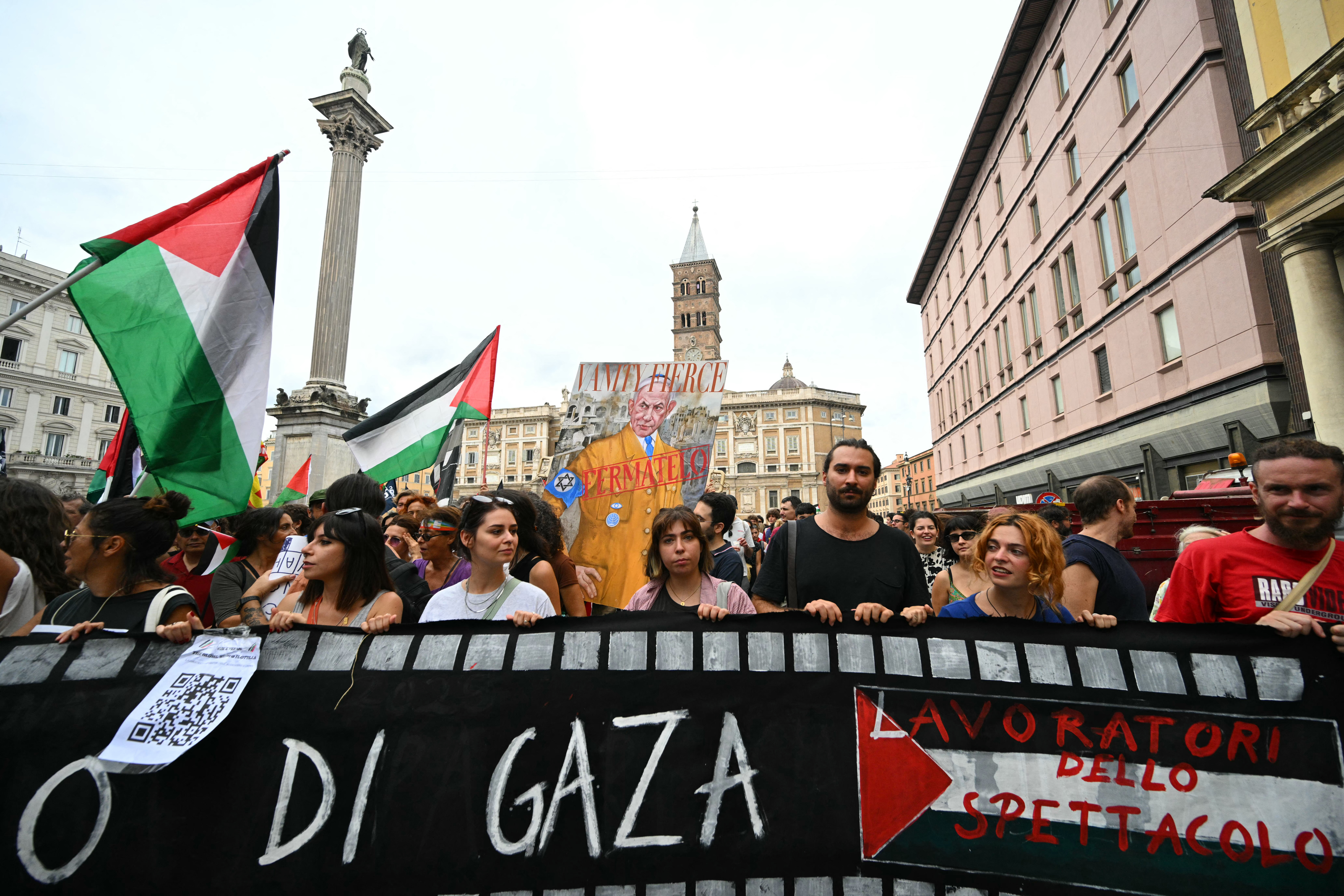 People march during a nationwide strike "Let's Block Everything" in solidarity with Palestinians in Gaza and calling for a halt to arms shipments to Israel, in Rome on September 22.