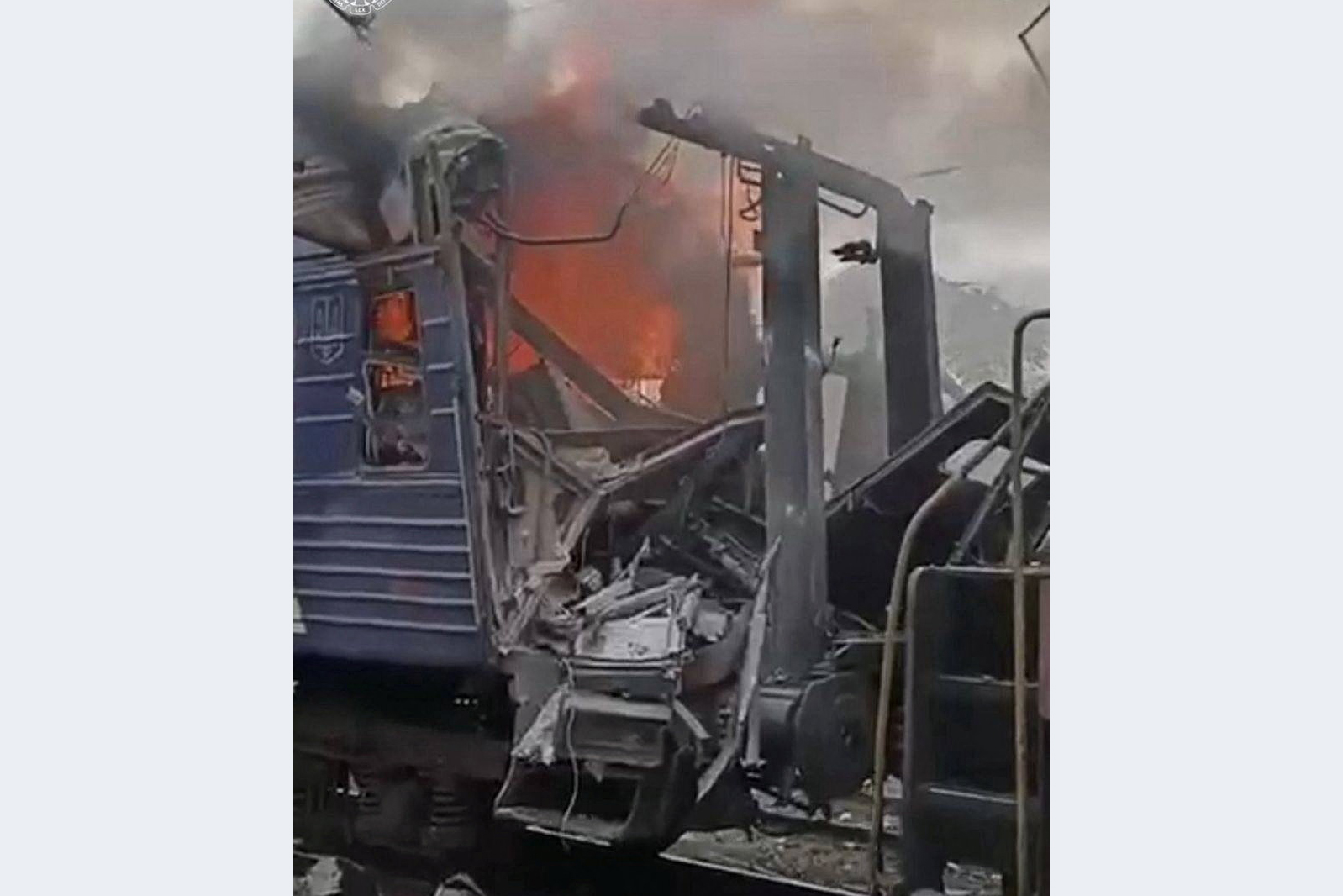 A train burns after being hit by the Russian drone strike, amid Russia's attack on Ukraine,