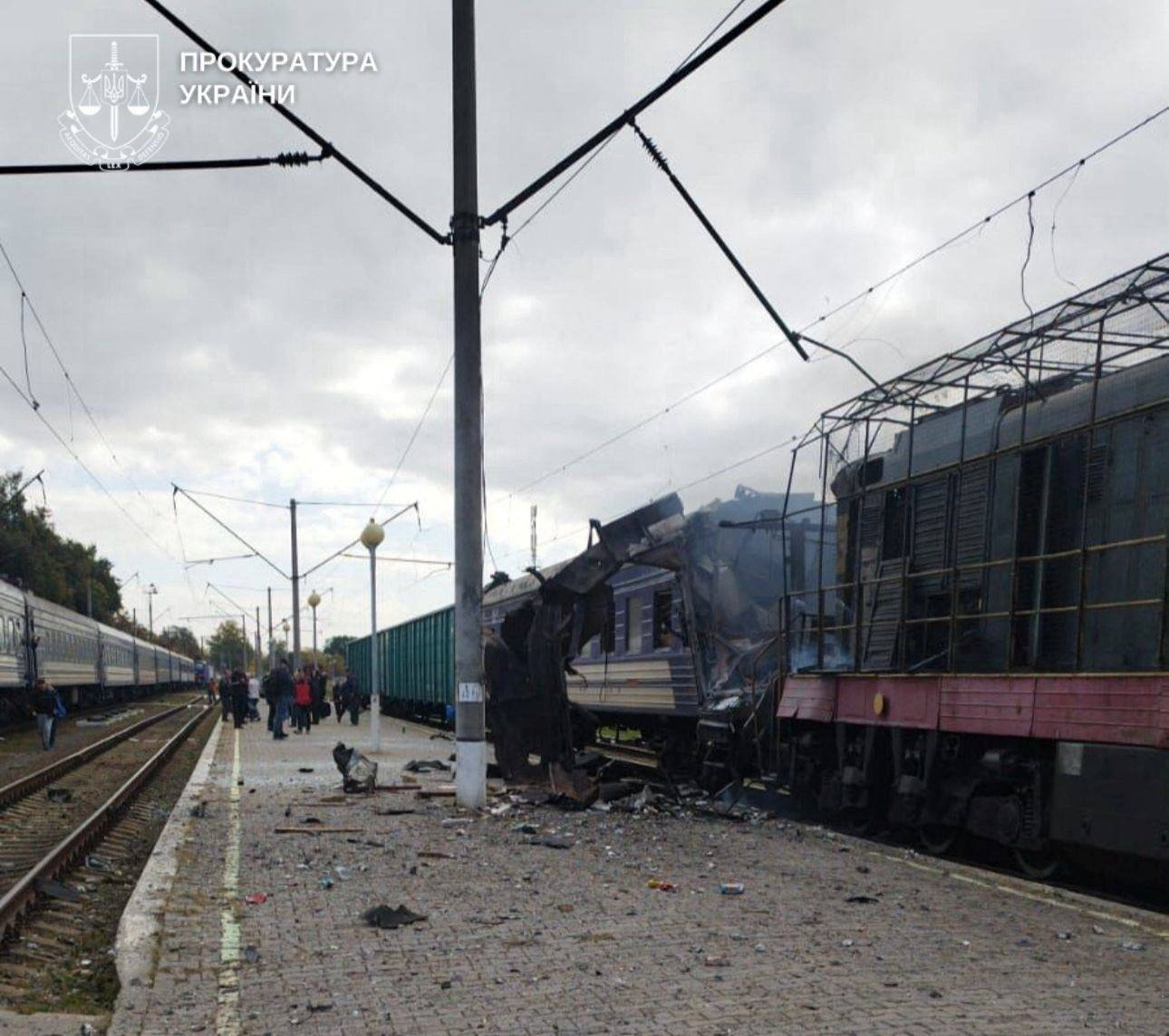 A train hit by a Russian drone sits damaged.
