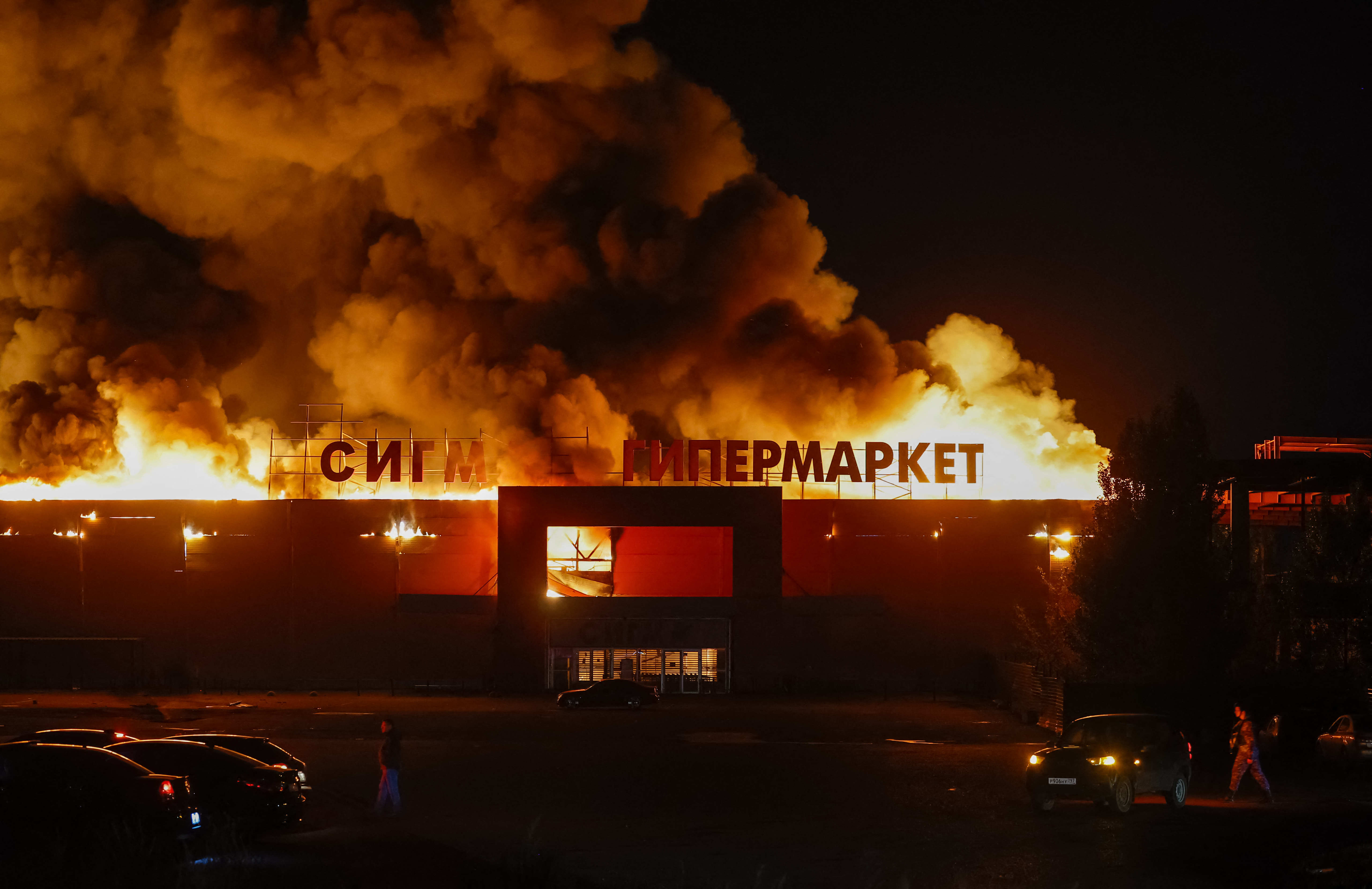 The Sigma shopping mall is on fire after it was hit by a Ukrainian military strike, in the course of Ukraine-Russia conflict in Donetsk, a Russian-controlled city of Ukraine, October 11, 2025. REUTERS/Alexander Ermochenko