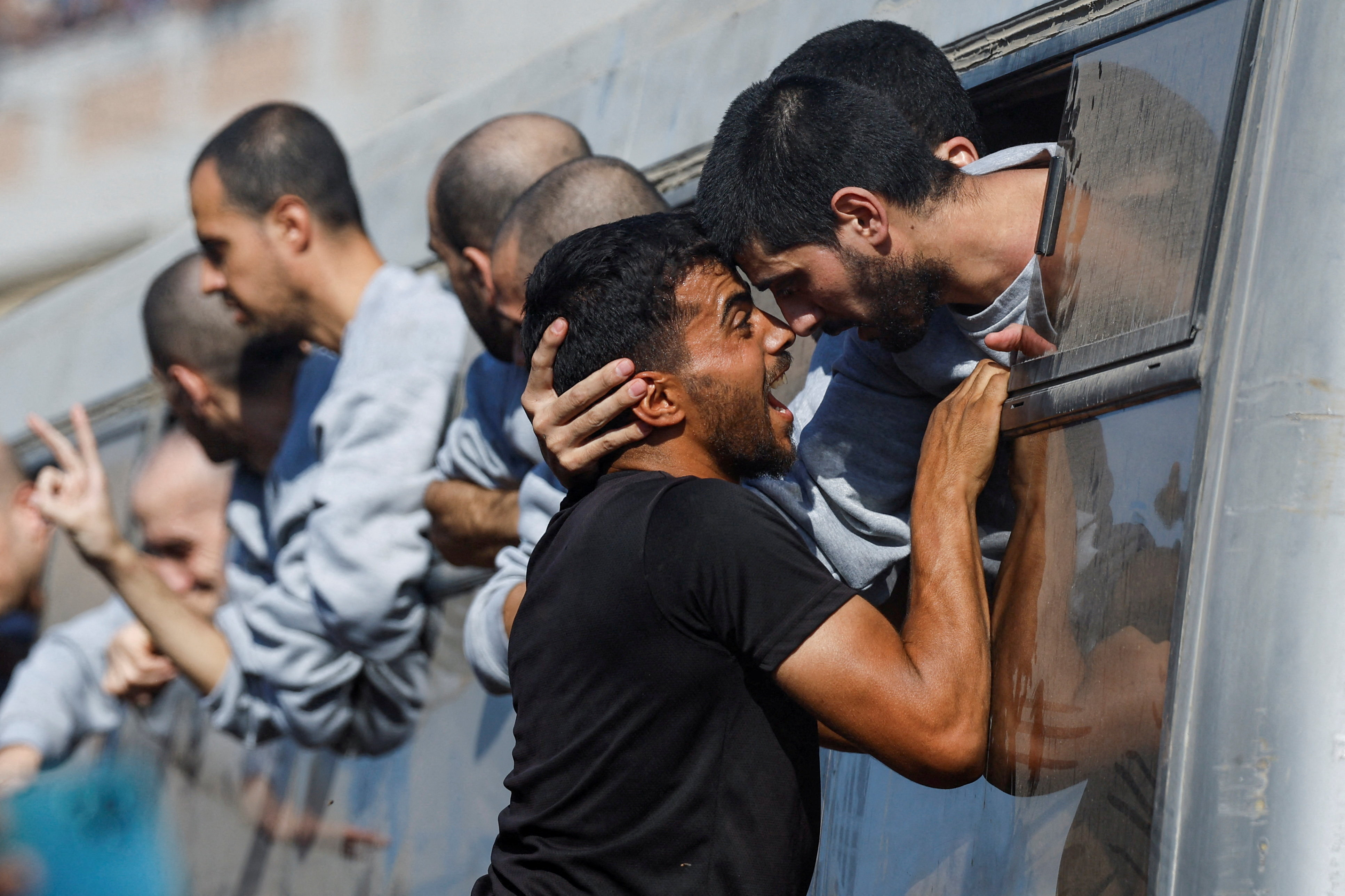 A man greets a freed Palestinian prisoner released by Israel as part of a hostages-prisoners swap and a ceasefire deal between Hamas and Israel, in Khan Younis in the southern Gaza Strip, October 13, 2025.